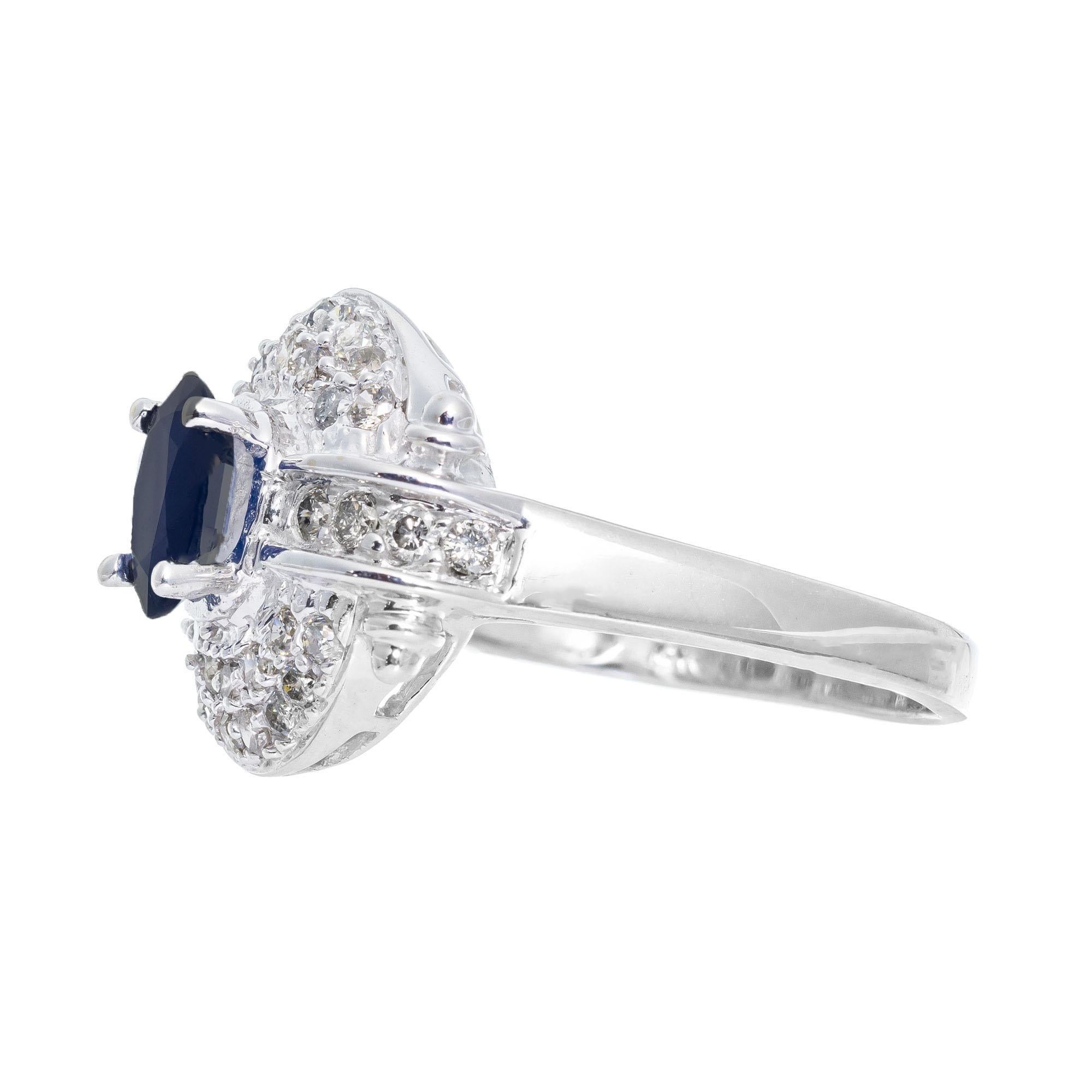 Oval Cut .65 Carat Blue Sapphire Diamond Halo White Gold Cocktail Ring For Sale
