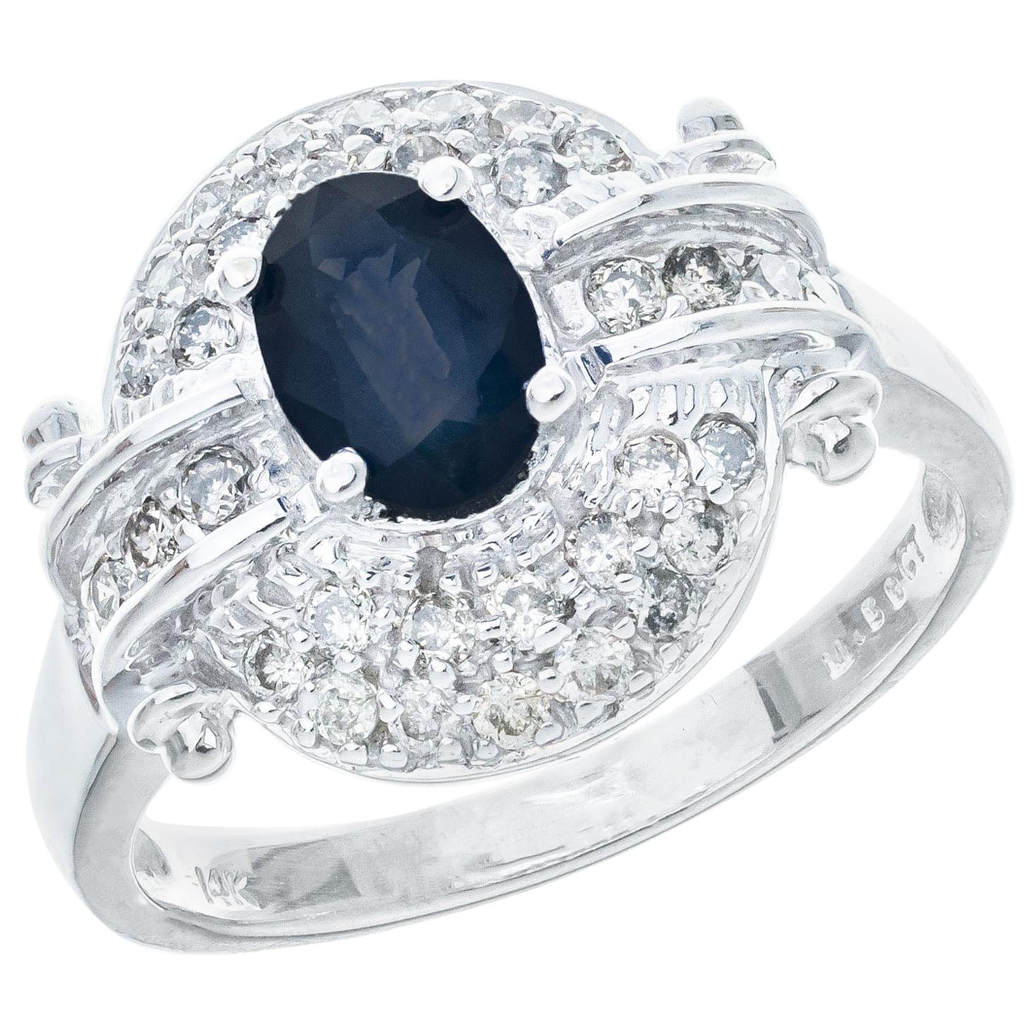 .65 Carat Blue Sapphire Diamond Halo White Gold Cocktail Ring For Sale