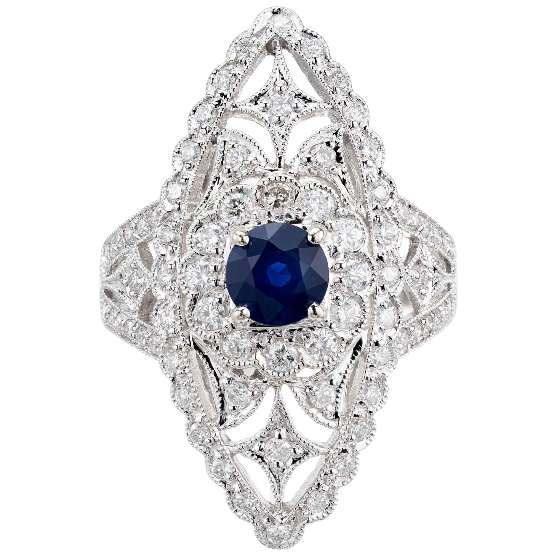 Bague cocktail en or blanc avec saphir bleu de 0,65 carat et diamants