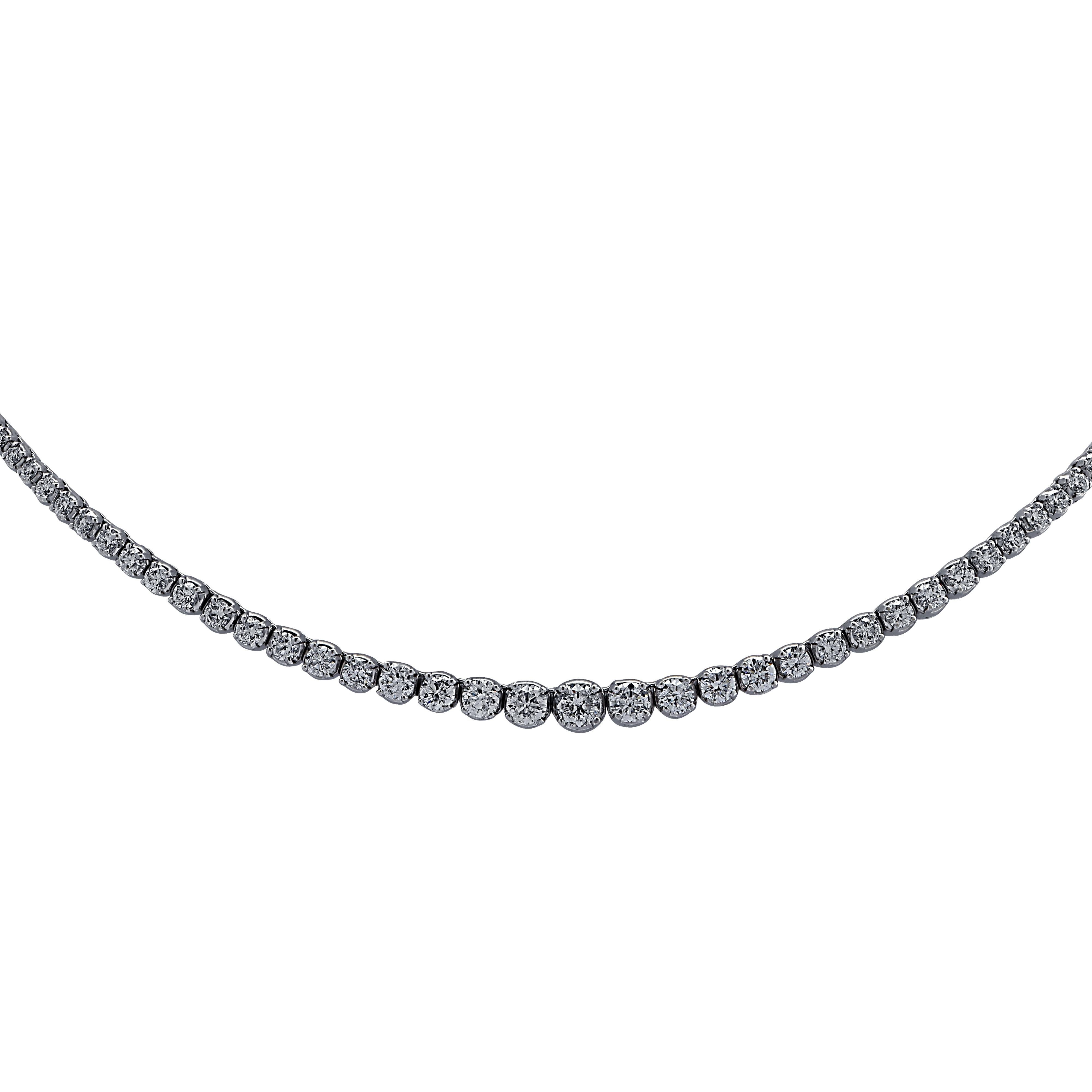 Exquisite diamond necklace crafted in White Gold, showcasing 137 round brilliant cut diamonds weighing 6.5 carats total, G color, SI clarity. The diamonds are set in a seamless sea of eternity, creating a spectacular symphony of brilliance and fire.