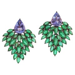 6.5 carat Emerald 3.52 carat Tanzanite 14 Karat Gold Vixen Stud Earrings