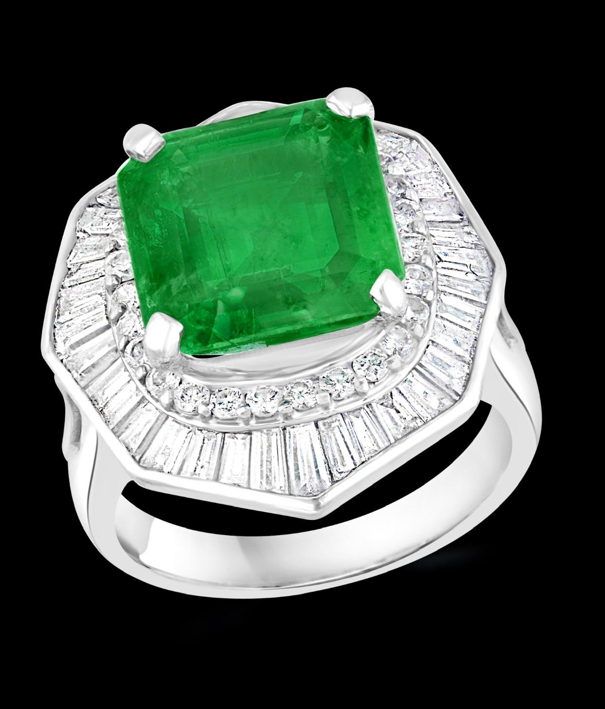 
6.5 Carat Emerald Cut Colombian Emerald & 2.4 Carat Diamond Ring Platinum Size 5
Colombian emeralds are very precious , Very Difficult to find and getting more more difficult to find.
A classic, Cocktail ring 
6.5 Carat  Colombian Emerald