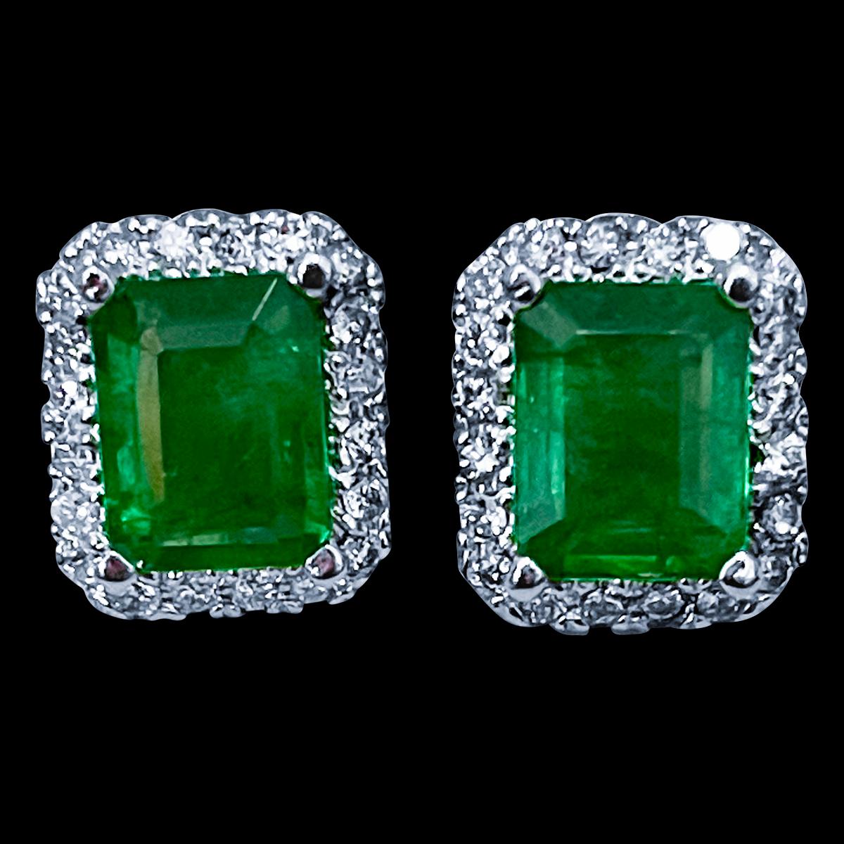 6.5 Carat Emerald Cut Emerald & 1.25 Ct  Diamond Stud Earrings 14 Kt White Gold
This exquisite pair of earrings are beautifully crafted with 14 karat White gold .
Weight of 14 K gold 6 Grams with emeralds
Each emerald is approximately 3.25 ct
Origin