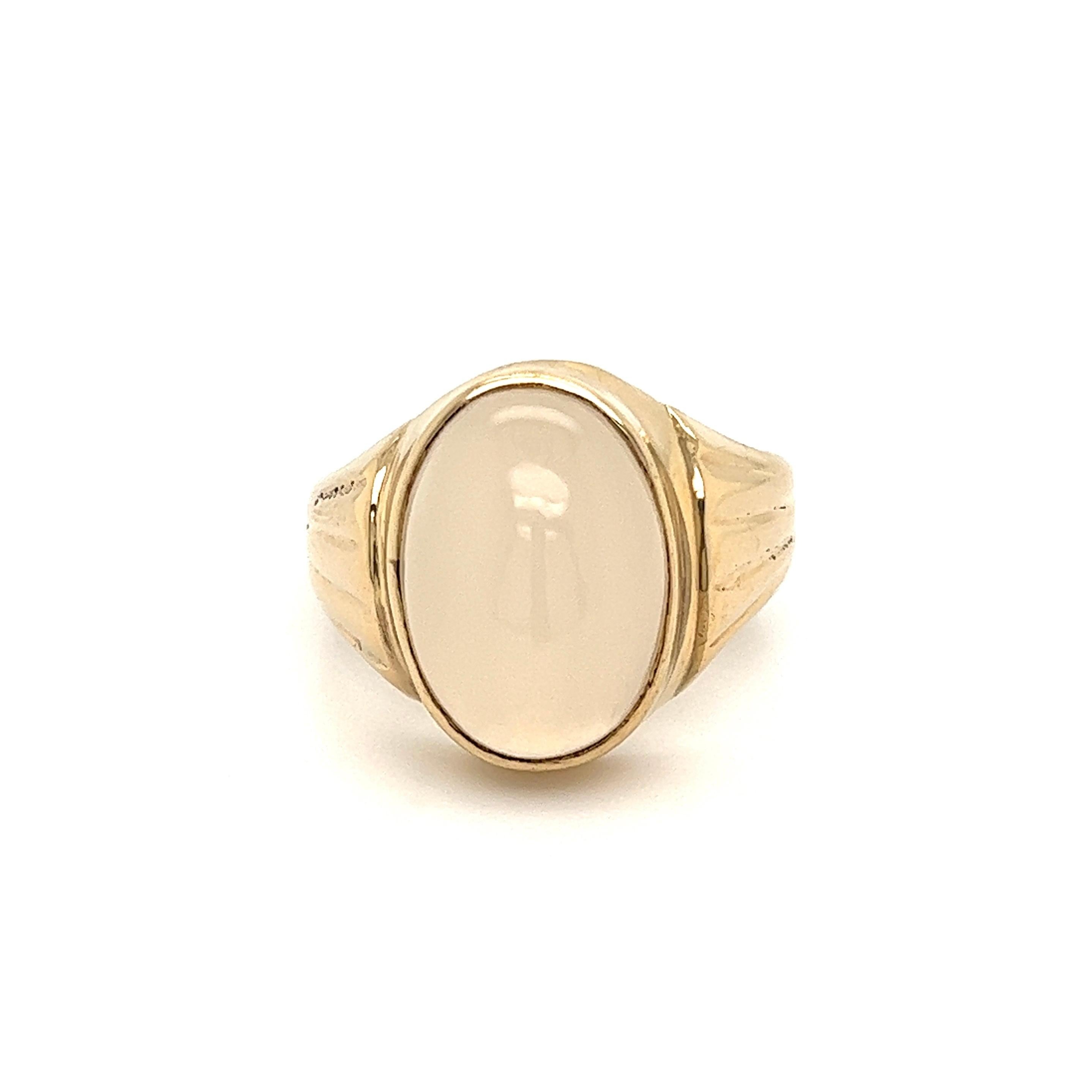 Handsome Fine Quality Gent’s Moonstone Gold Signet Ring. Securely set with an Oval 6.50 Carat Moonstone, hand crafted in 14Karat Yellow Gold mounting. Ring size 10, ring sizing available. Dimensions 1.19”w x 0.85”h x 0.66”d. In excellent condition,
