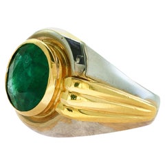6.5 Carat Oval Cut Emerald in 18 Karat Two-Tone Gold Ring Estate