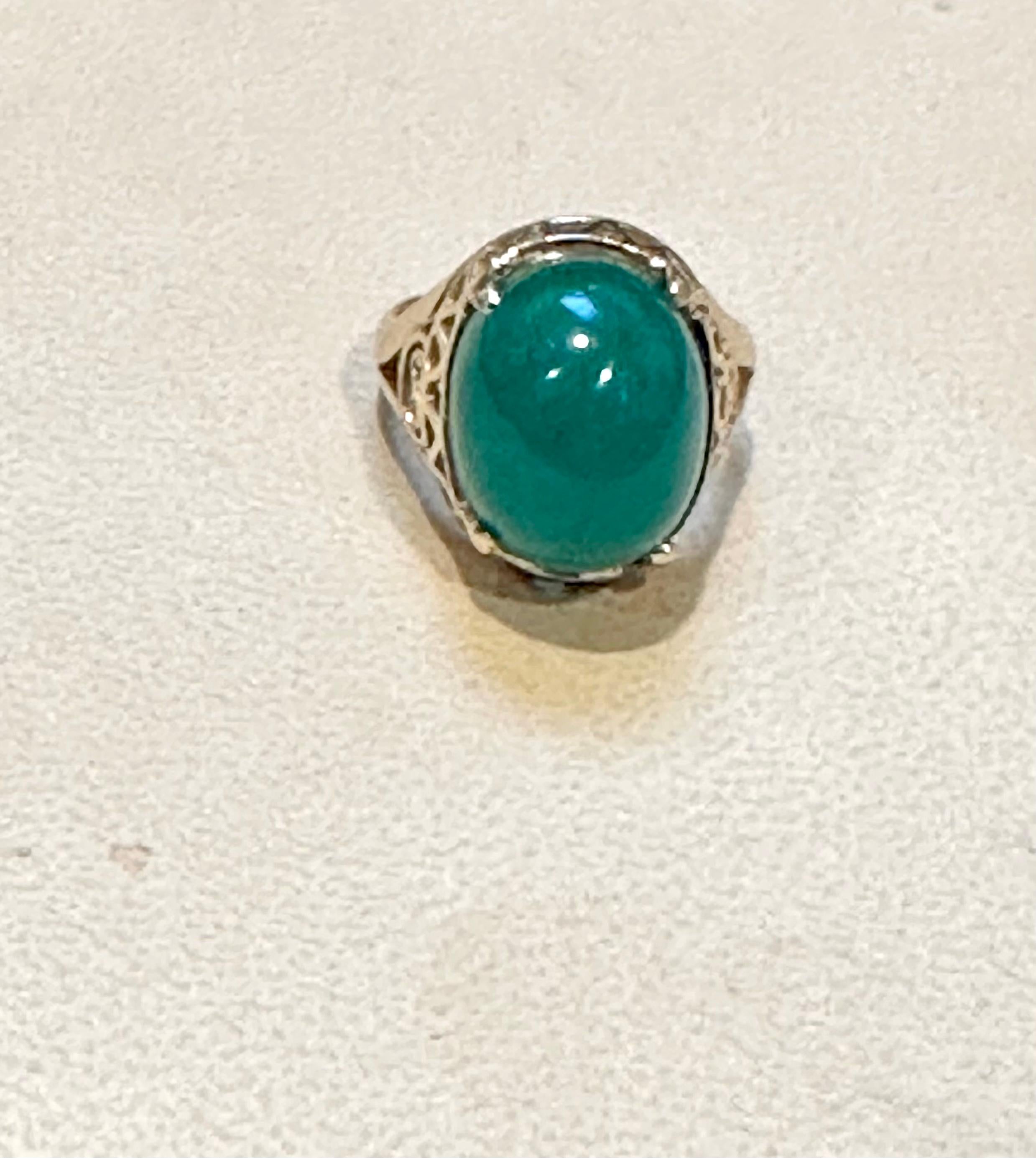 6.5 Carat Oval Emerald Cabochon 14 Karat Yellow Gold Cocktail Ring Vintage For Sale 1