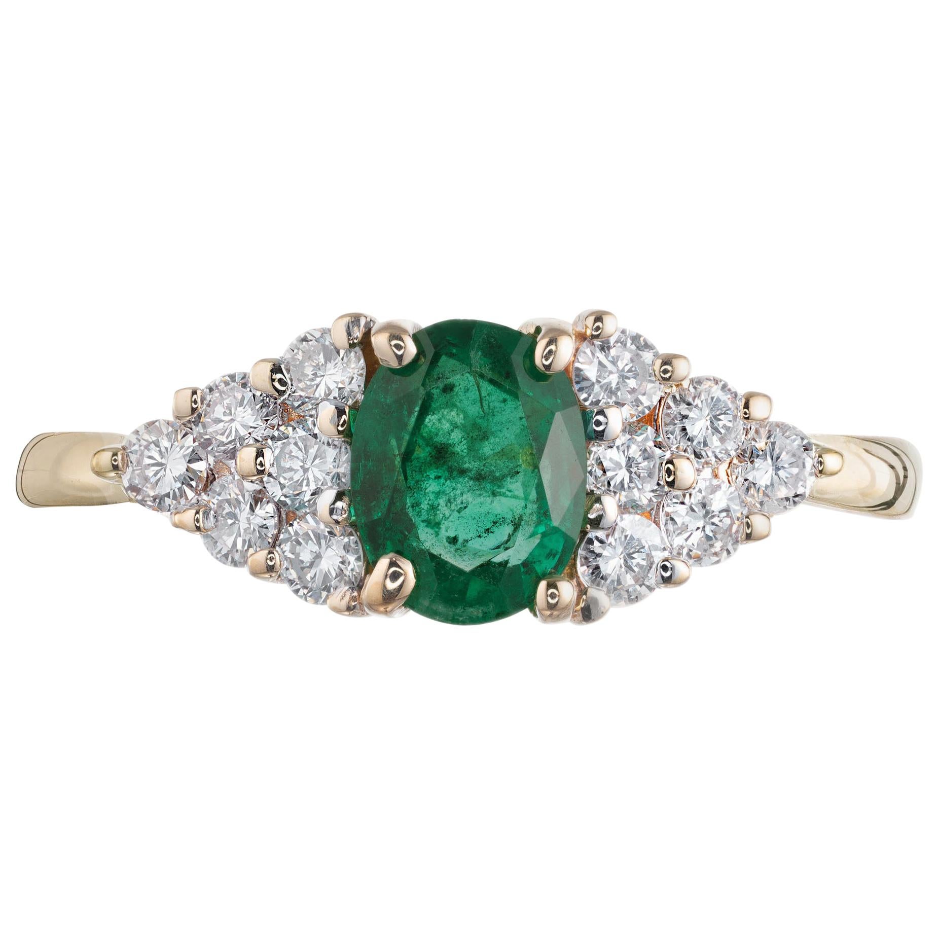 .65 Carat Oval Emerald Diamond Gold Cluster Engagement Ring For Sale