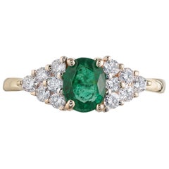 .65 Carat Oval Emerald Diamond Gold Cluster Engagement Ring