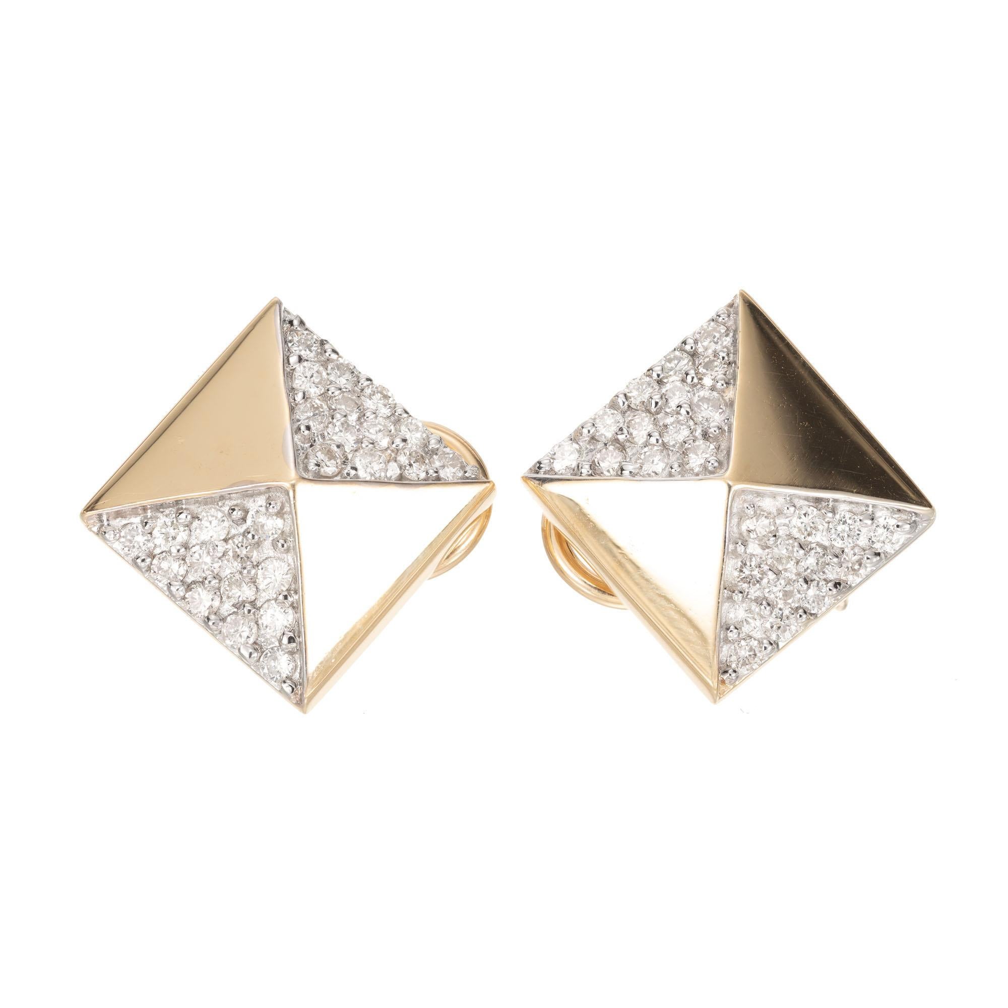 Pyramid design 14k yellow gold clip post earrings with 52 round full cut Pavé set diamonds.

52 round full cut Diamonds, approx. total weight .65cts, H, SI1
14k yellow gold
Tested: 14k
Stamped: 585
Hallmark: *
Top to bottom: 18.85mm or .74