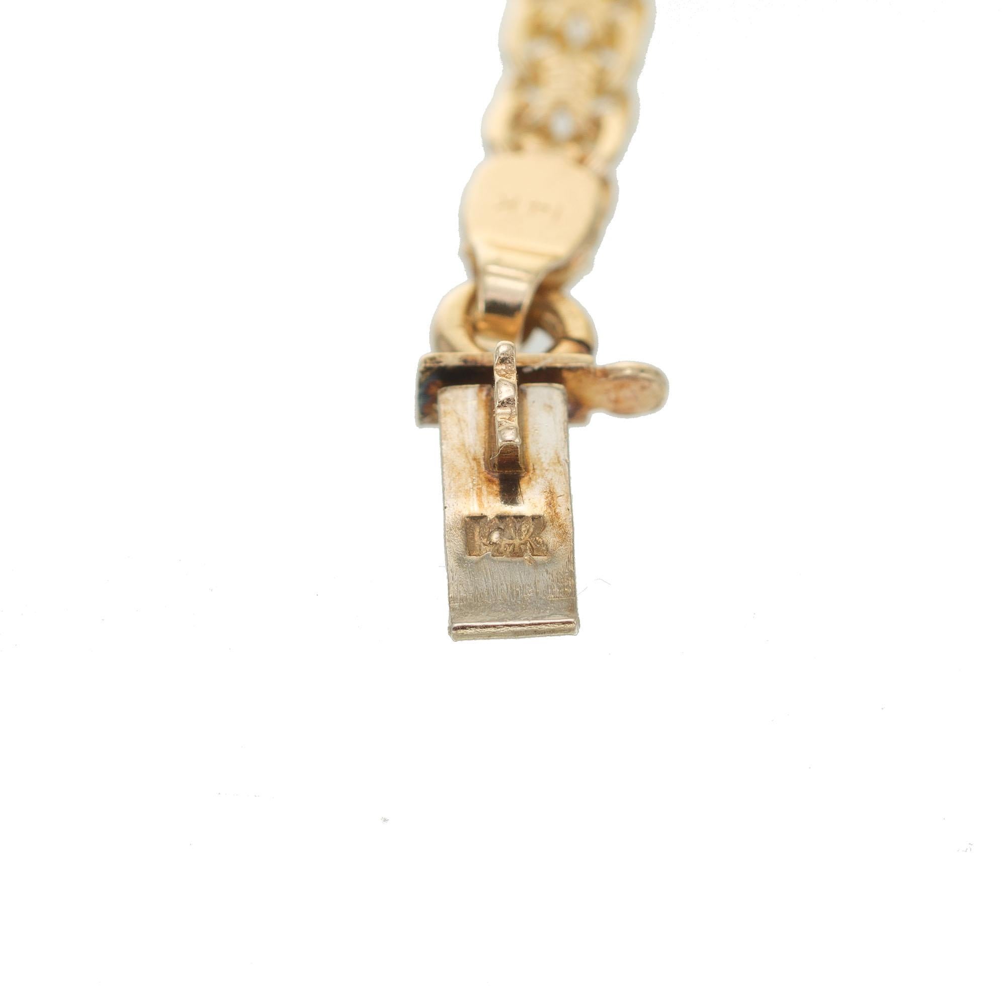 Taille ronde Bracelet caractéristique en or avec tourmaline rose de 0,65 carat et diamant en forme de tourbillon en vente