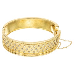 Vintage .65 Carat Round Bezel Set Diamond Yellow Gold Handmade Bangle Bracelet