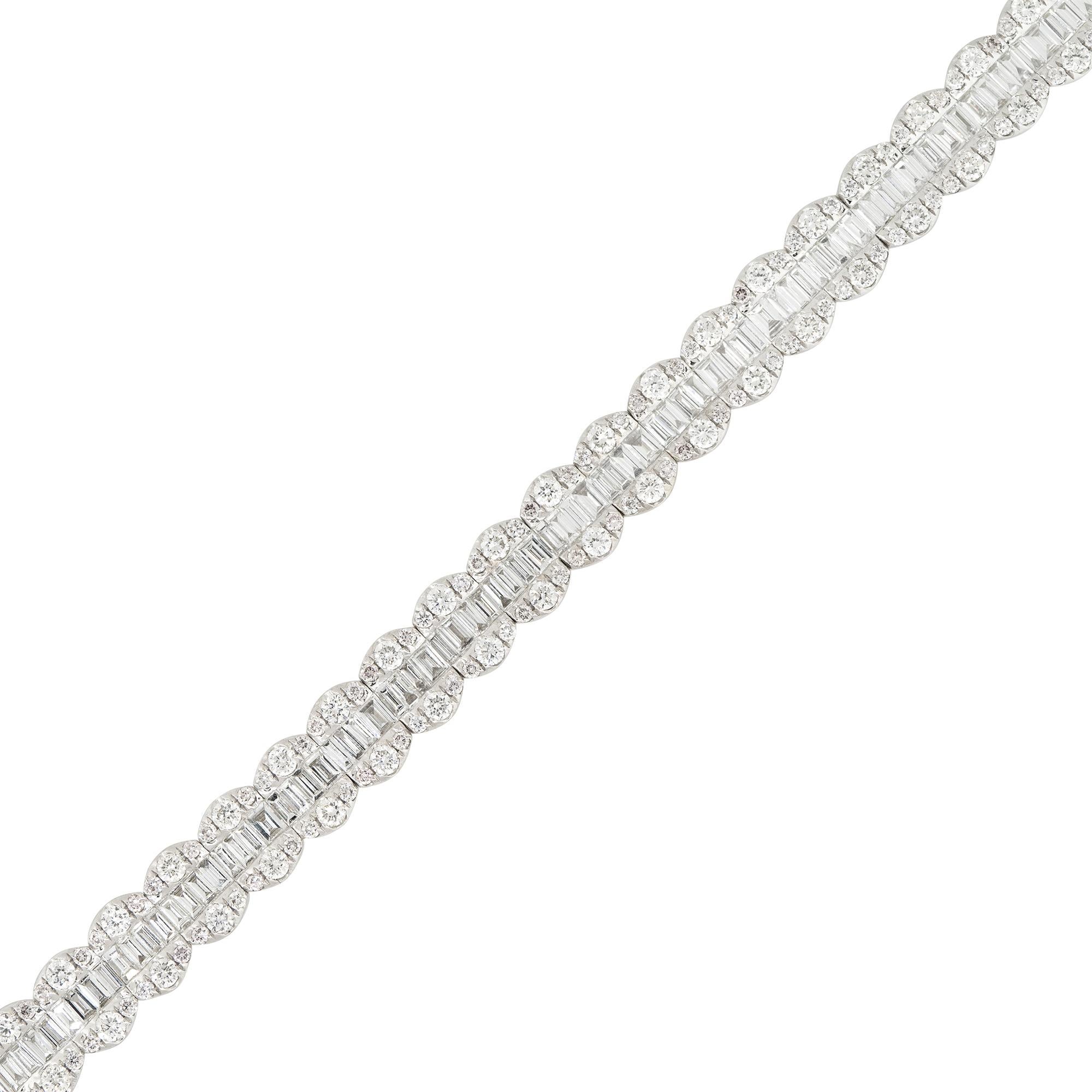 18k White Gold 6.5ctw Round Brilliant and Baguette Cut Diamond Bracelet
Material: 18k White Gold
Diamond Details: There are approximately 3.19ctw of Round Brilliant cut Diamonds (214 stones total). And there are approximately 3.31ctw of Baguette cut