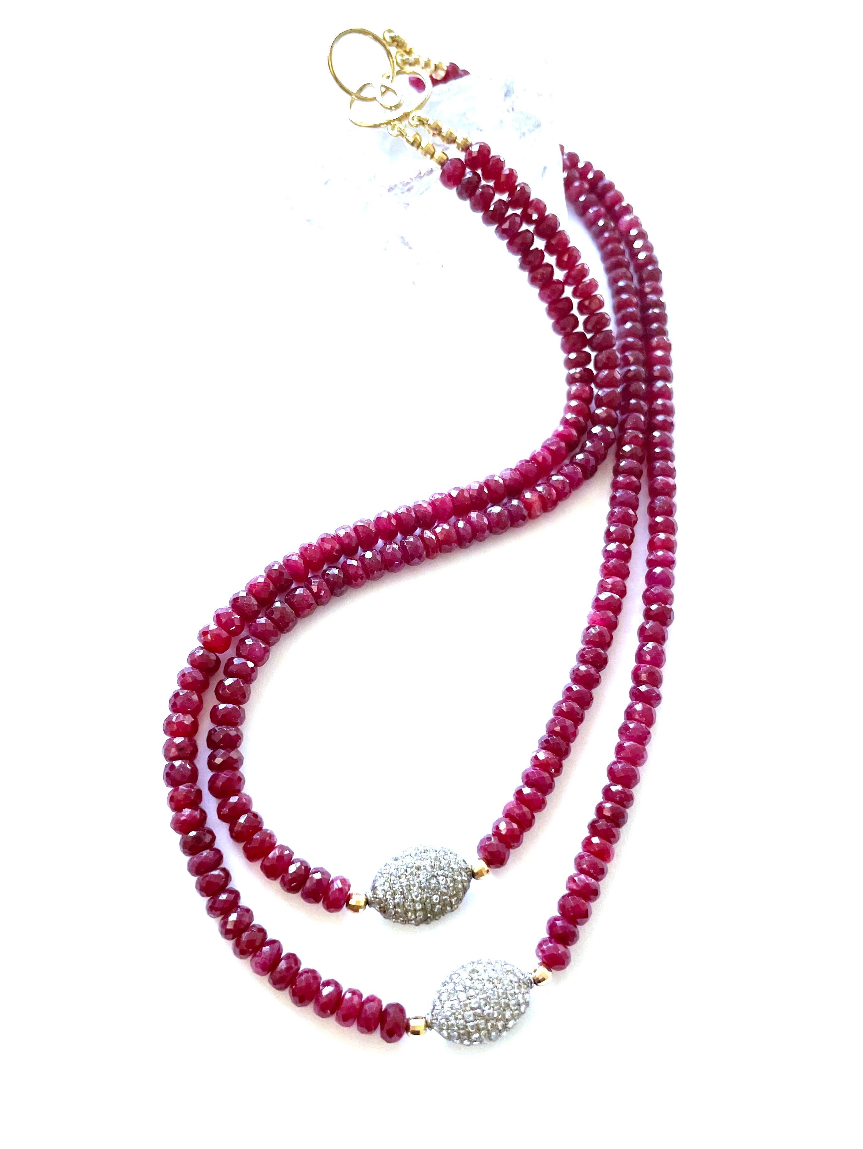 Description
Ruby, pave diamond accent beads, two strand necklace.
Item # N3753

Materials and Weight
Ruby, 5mm faceted rondelle beads, 65 carats.
Pave diamonds 10 x 15mm.
Rhodium sterling silver.
14k yellow gold.

Dimensions
Length 16-17.75