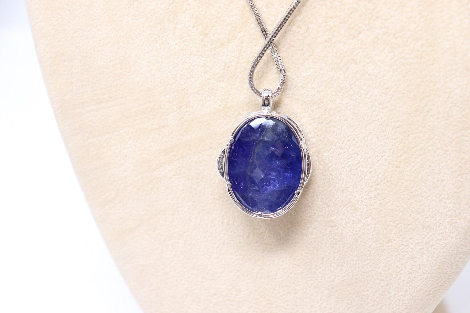 65 Ct Tanzanite and Diamond Pendant Necklace in 18 Kt White Gold For Sale 4