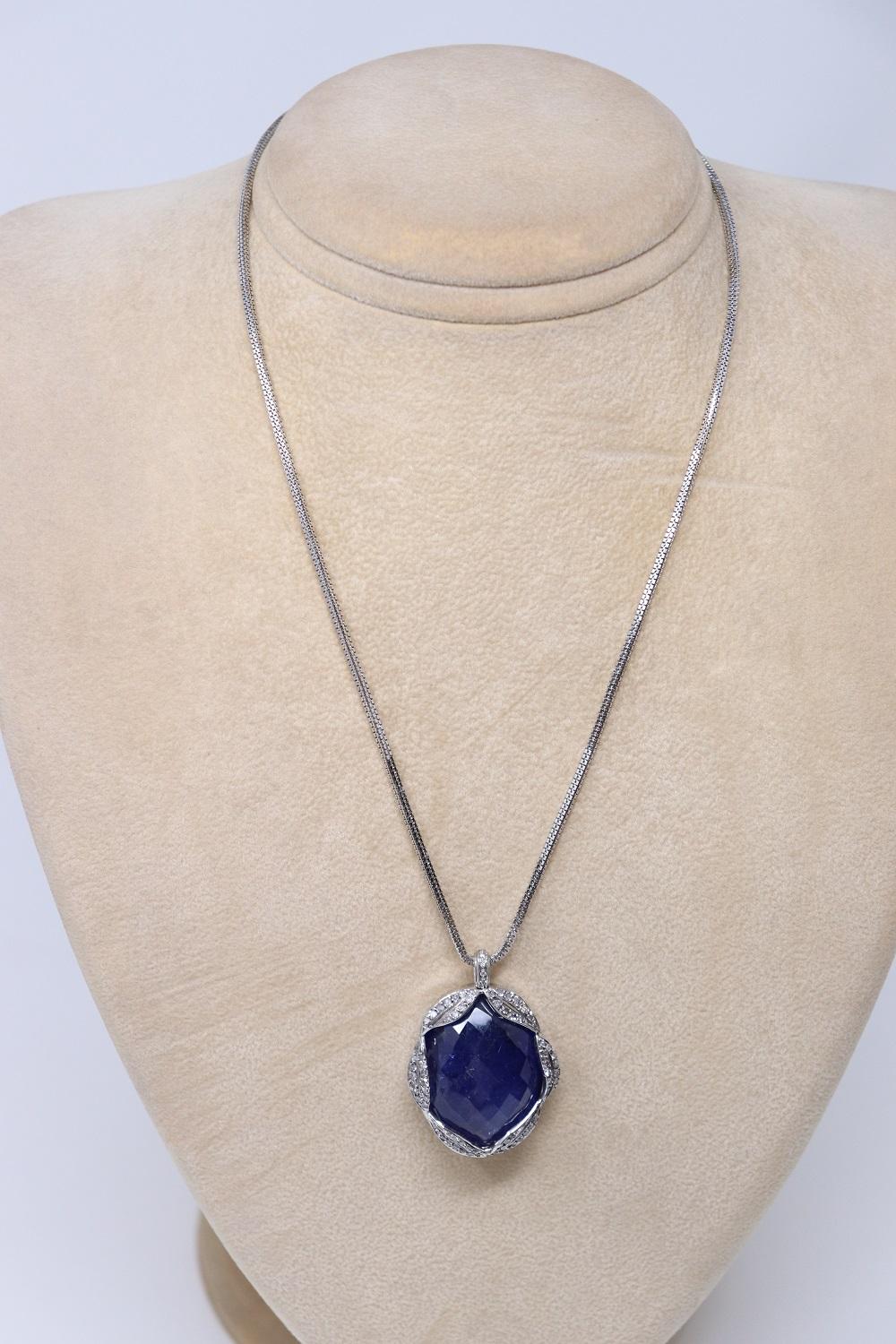 65 Ct Tanzanite and Diamond Pendant Necklace in 18 Kt White Gold For Sale 1