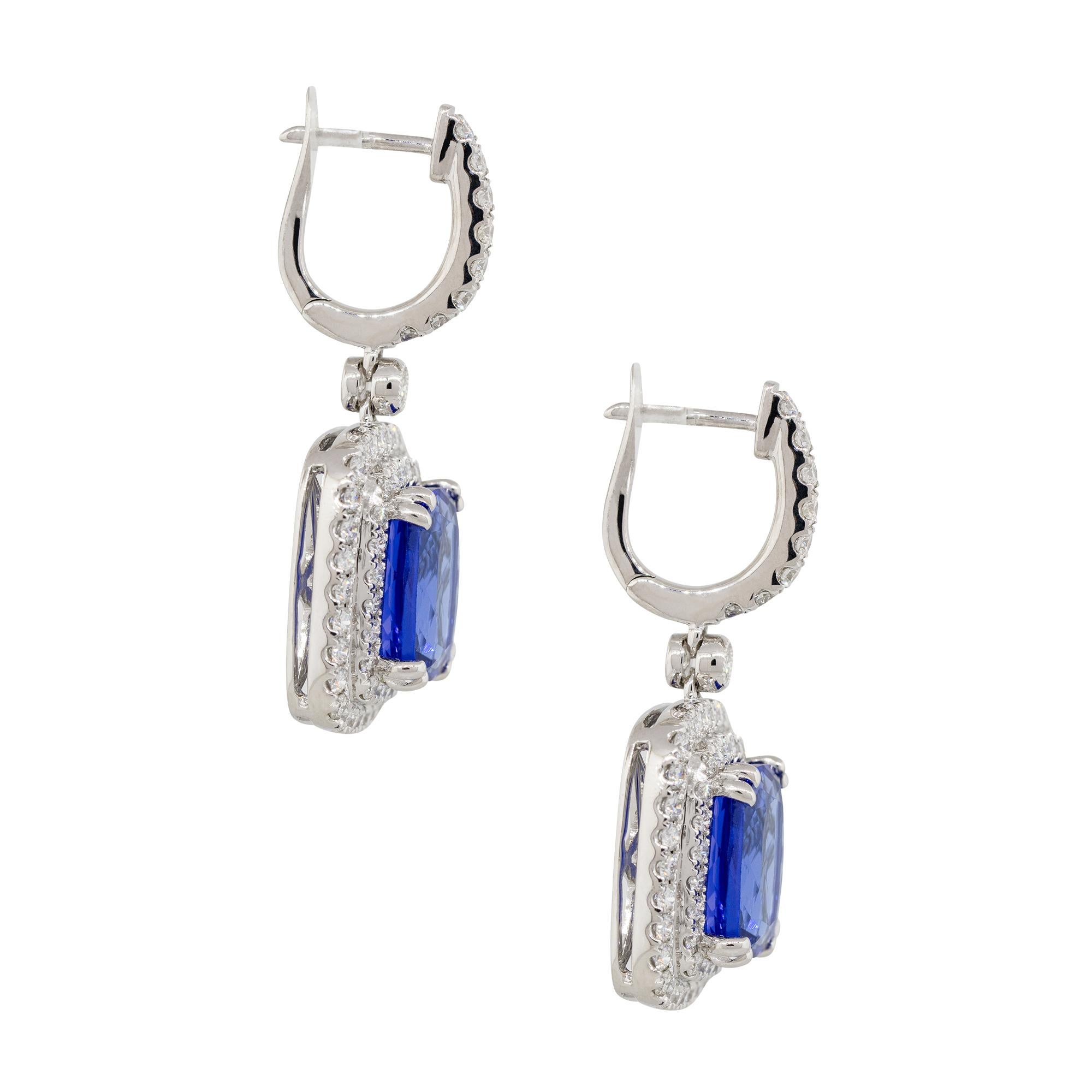 Material: 18k White Gold
Style: Tanzanite Earrings With Diamond Halo
Diamond Details: Approx. 1.62ctw of round cut diamonds. Diamonds are G/H in color and VS in clarity
Gemstone Details: Approx. 6.50ctw of cushion cut Tanzanite gemstones
Earring