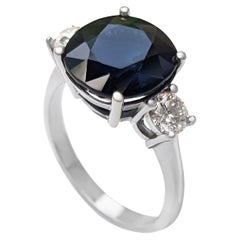 6.50 Carat Dark Blue Sapphire and 0.62 Ct Diamonds, 18 Kt. White Gold, Ring