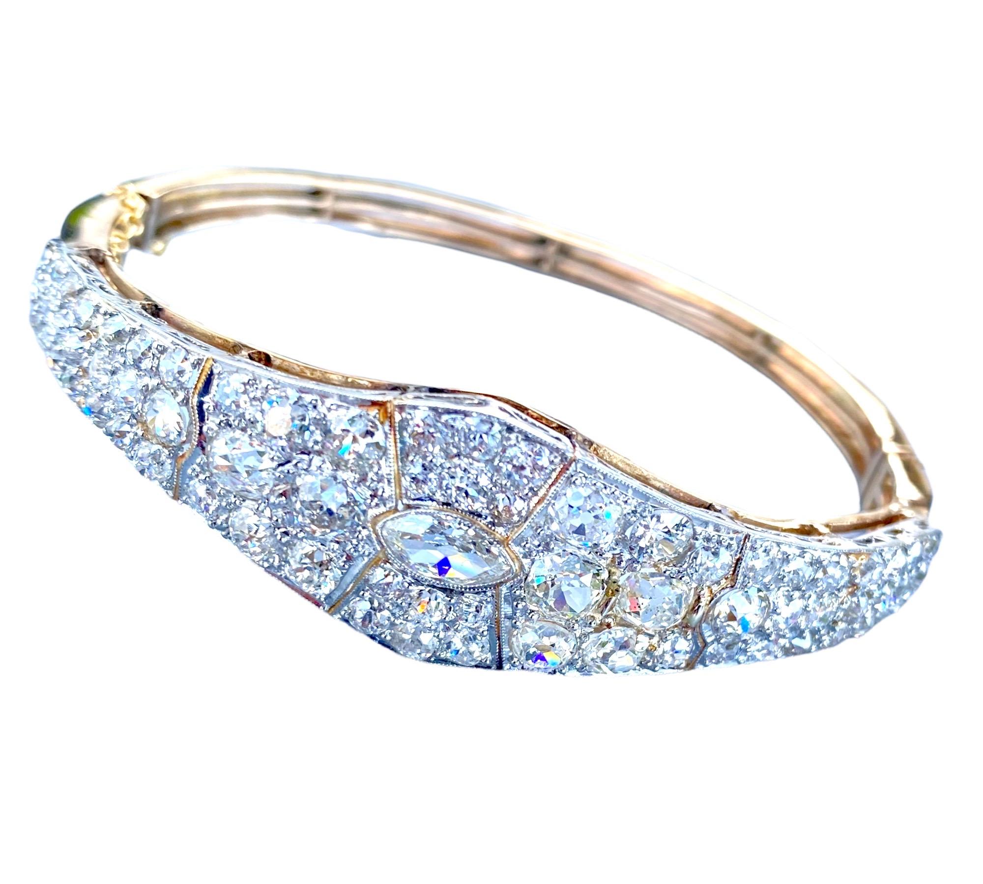 Platinum encrusted diamond pave bracelet. The bracelet base and backside are all made of yellow-colored gold.
Exceptional diamonds are pave-set in platinum.
 European cut diamonds set in platinum. 
The quality of diamonds is VS
 clarity and F-G