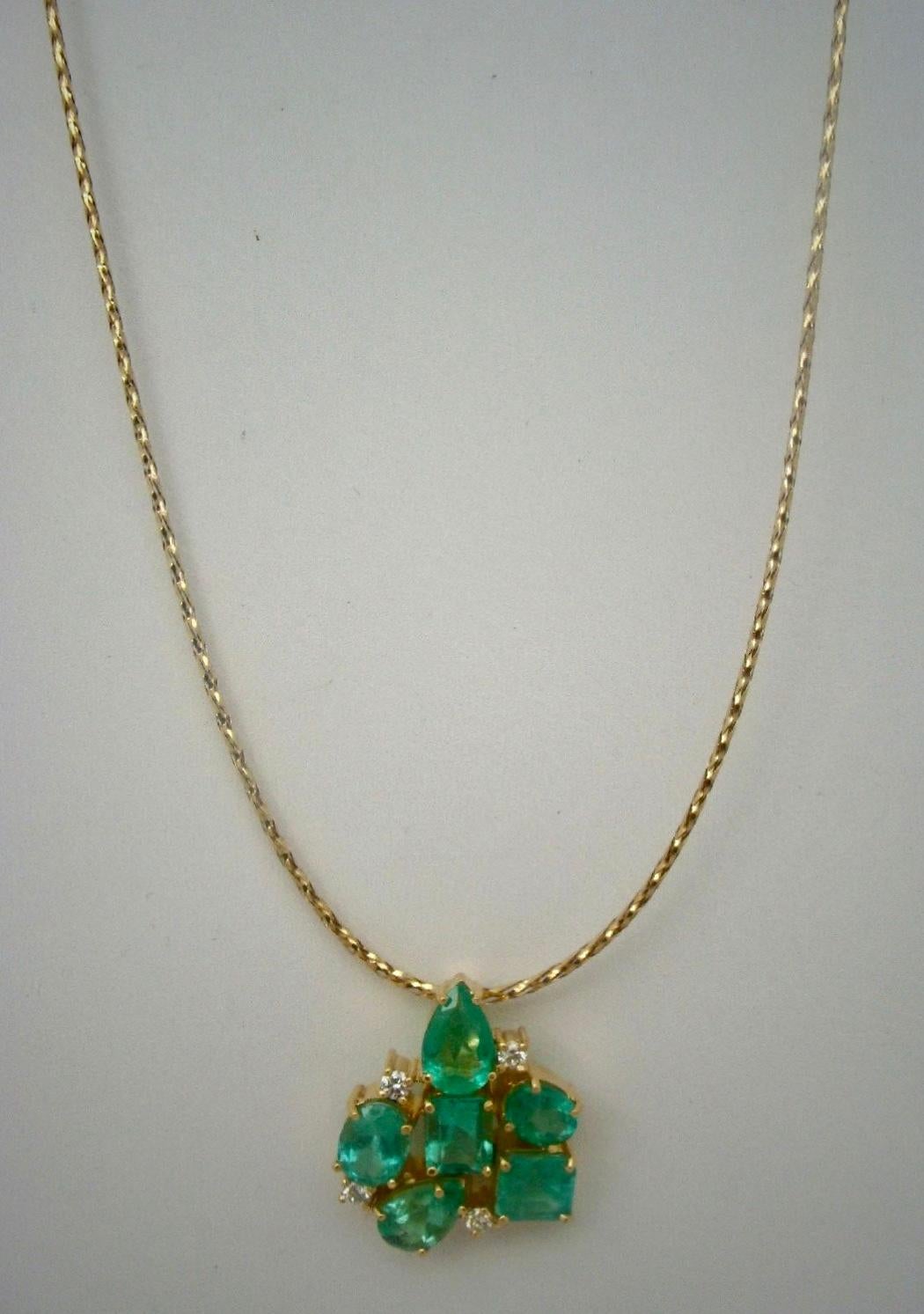 Emerald Cut 12.34 Carats Colombian Emerald Diamond Cocktail Pendant Necklace 18 Karat For Sale