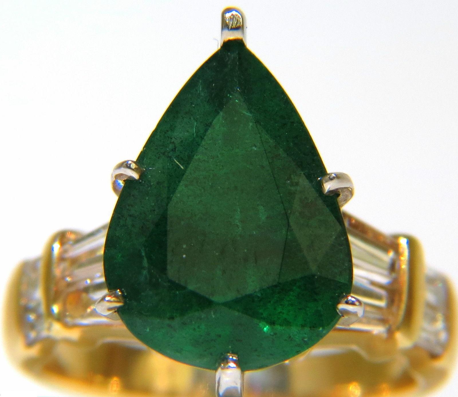 5.50ct. Natural emerald diamond ring.

Emerald measures 13.43 X 10.30mm (with out the prongs).

Deep Green tone and moderate transparency

side diamonds:

1.00ct. H-color Vs-1 Vs-2 clarity.

14kt. yellow & White gold  

This ring can be sized,