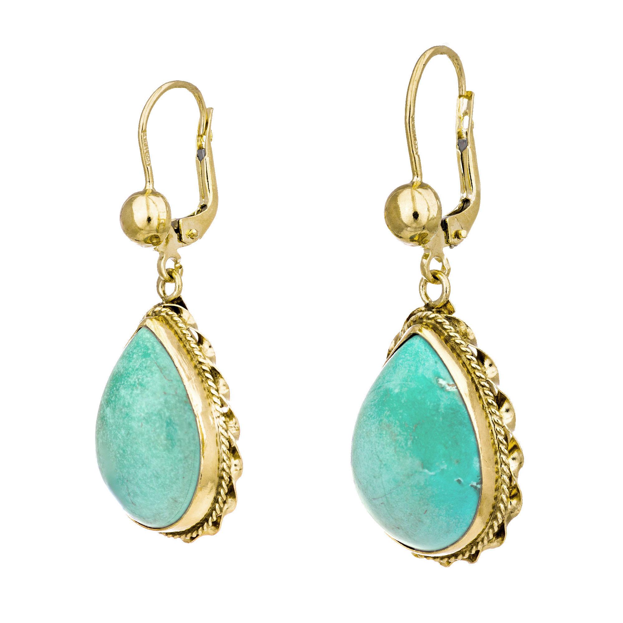 Pear shaped Turquoise 14k yellow gold dangle earrings. Handmade circa 1940s with natural untreated Turquoise.

2 natural pear shaped soft greenish blue Turquoise, approx. total weight 6.50cts, 17 x 12.5mm, well-polished
14k Rose Gold
Tested and