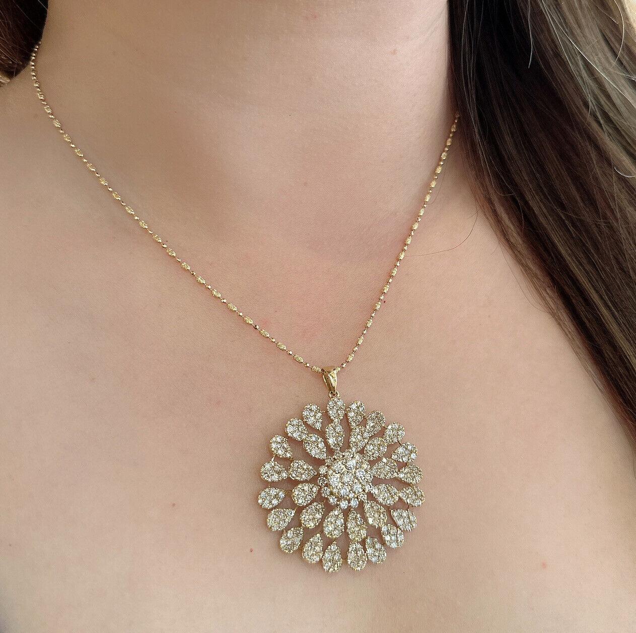 6.50 Carat Pave Diamond Flower Medallion Pendant Necklace 18k Yellow Gold 

Diamond Star Pendant Necklace features a Large Star Medallion with a total of 6.50 carats of Champagne-colored Round Brilliant Diamonds Pavé set in 18k Yellow Gold. The