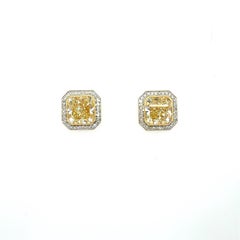 6.50 Carat Radiant Cut Yellow Diamond Diamond Stud Earrings