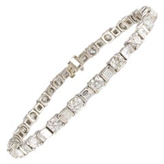Pulsera de oro blanco con diamantes redondos y baguette de 6,50 quilates totales