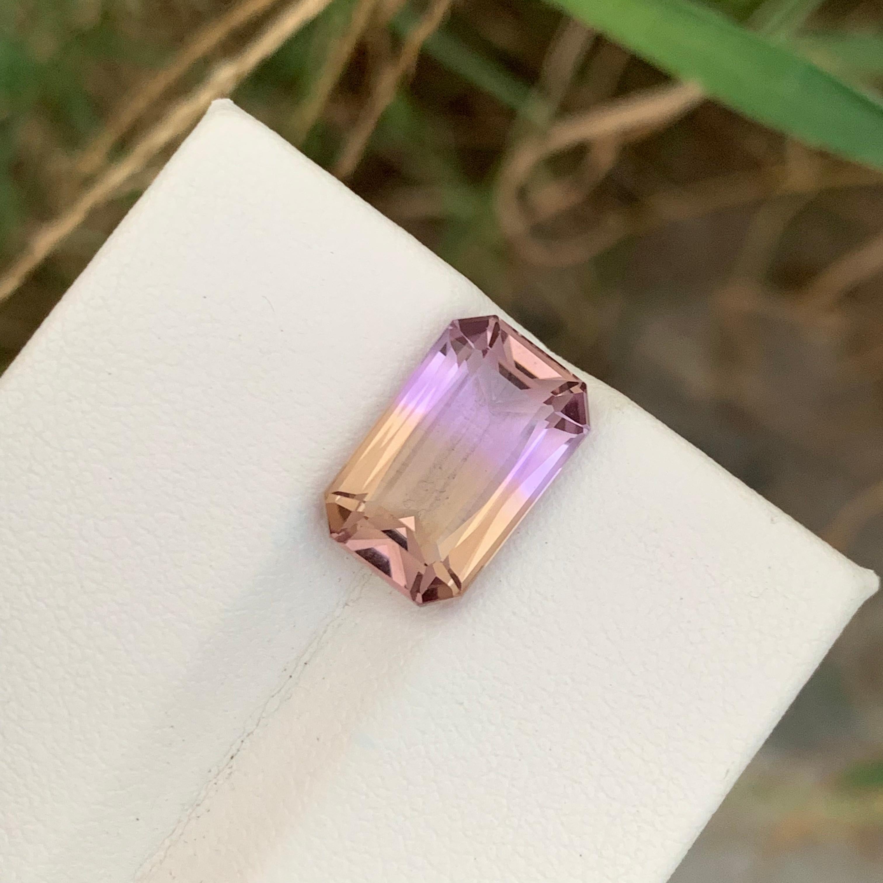 Loose Ametrine 
Weight: 6.50 Carats
Dimension: 14.3x9.2x7.1 Mm 
Origin: Brazil
Color: Purple & Yellow 
Shape: Emerald 
Treatment: Non
Certficate: On Customer Demand 
.
Ametrine, a captivating and visually striking gemstone, is a unique blend of two
