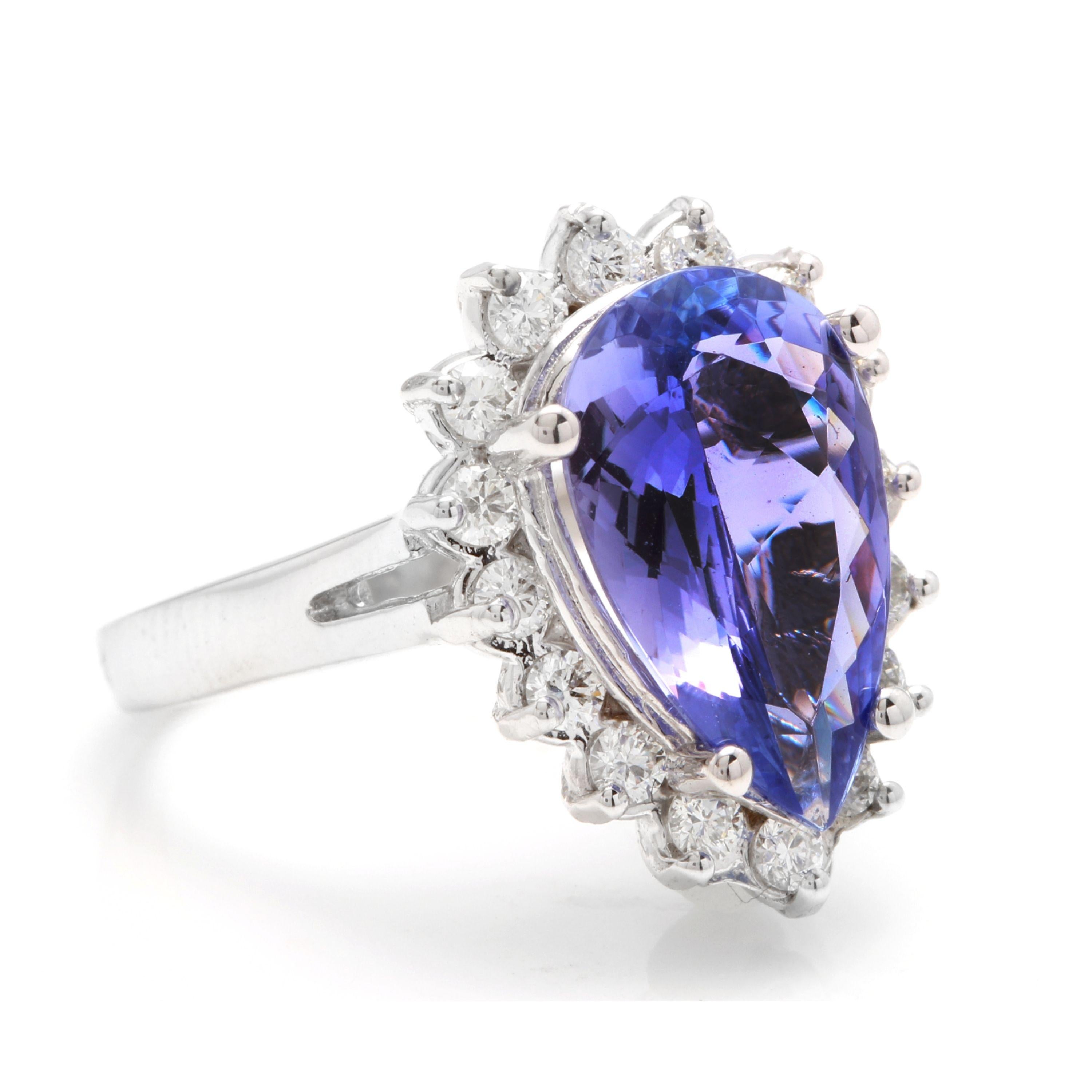 6.50 Carats Natural Very Nice Looking Tanzanite and Diamond 14K Solid White Gold Ring

Total Natural Pear Shaped Tanzanite Weight is: Approx. 6.00 Carats

Tanzanite Measures: Approx. 14.50 x 8.50mm

Natural Round Diamonds Weight: Approx. 0.50 Carats