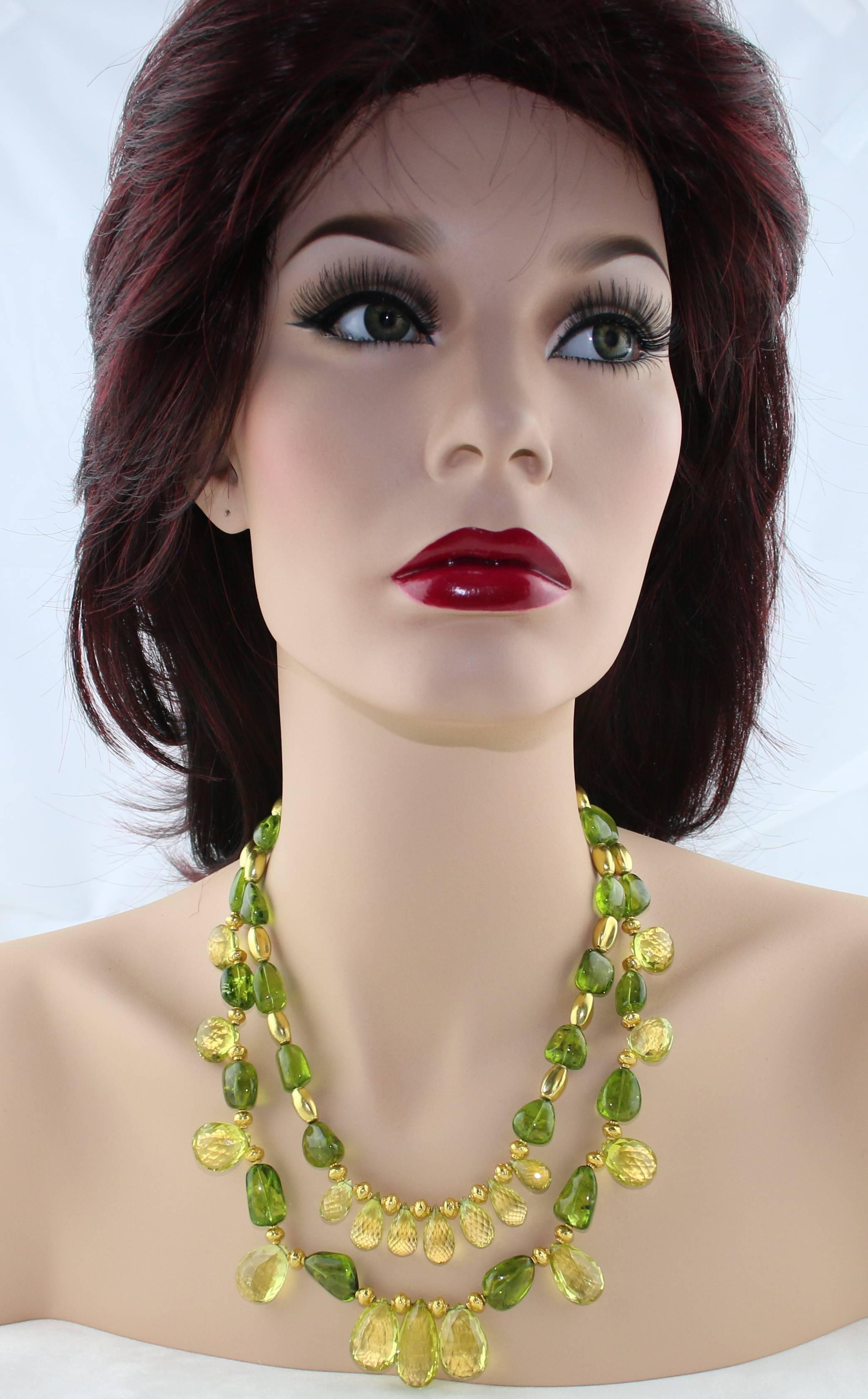 Very Regal Two Strand Necklace
The necklace is 18K Yellow Gold
There are 650.00 Carats in Lime Citrine And Peridot
The necklace measures 17.5