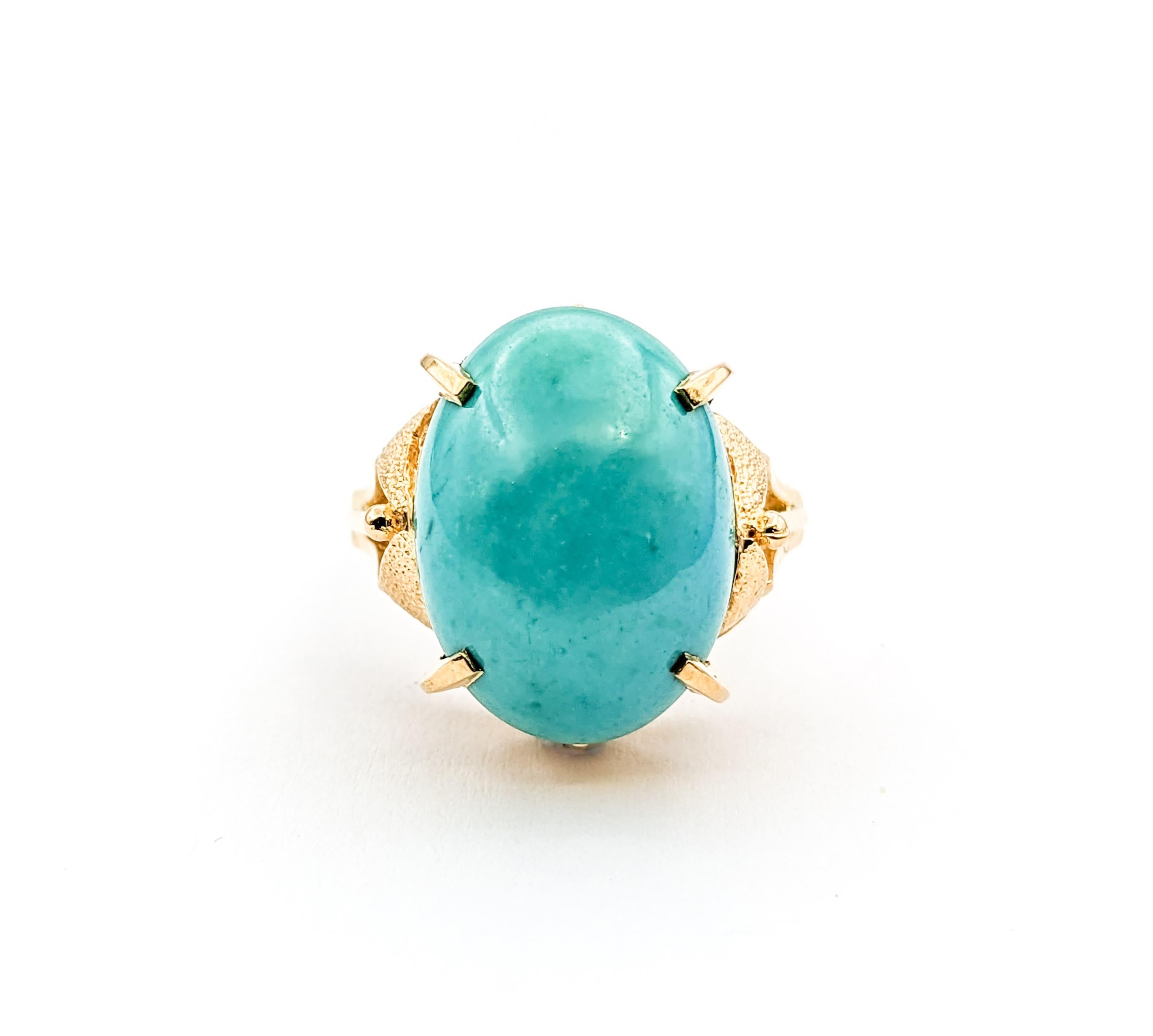 6.50ct Cabochon Turquoise In Yellow Gold

Discover the charm of our Gemstone Fashion Ring, beautifully crafted in 18kt yellow gold. This ring features a stunning centerpiece: a 6.50ct cabochon turquoise, showcasing the vibrant and unique beauty of