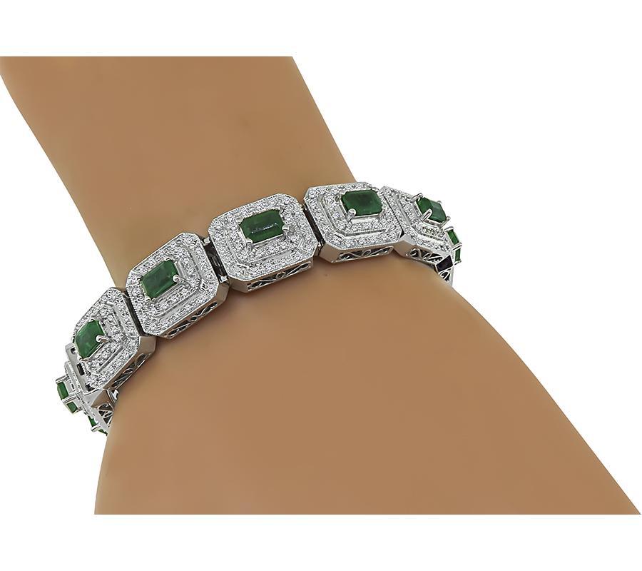 This is an elegant 14k white gold bracelet. The bracelet is set with lovely emerald cut emeralds that weigh approximately 6.50ct. The emeralds are accentuated by sparkling round cut diamonds that weigh approximately 4.00ct. The color of these