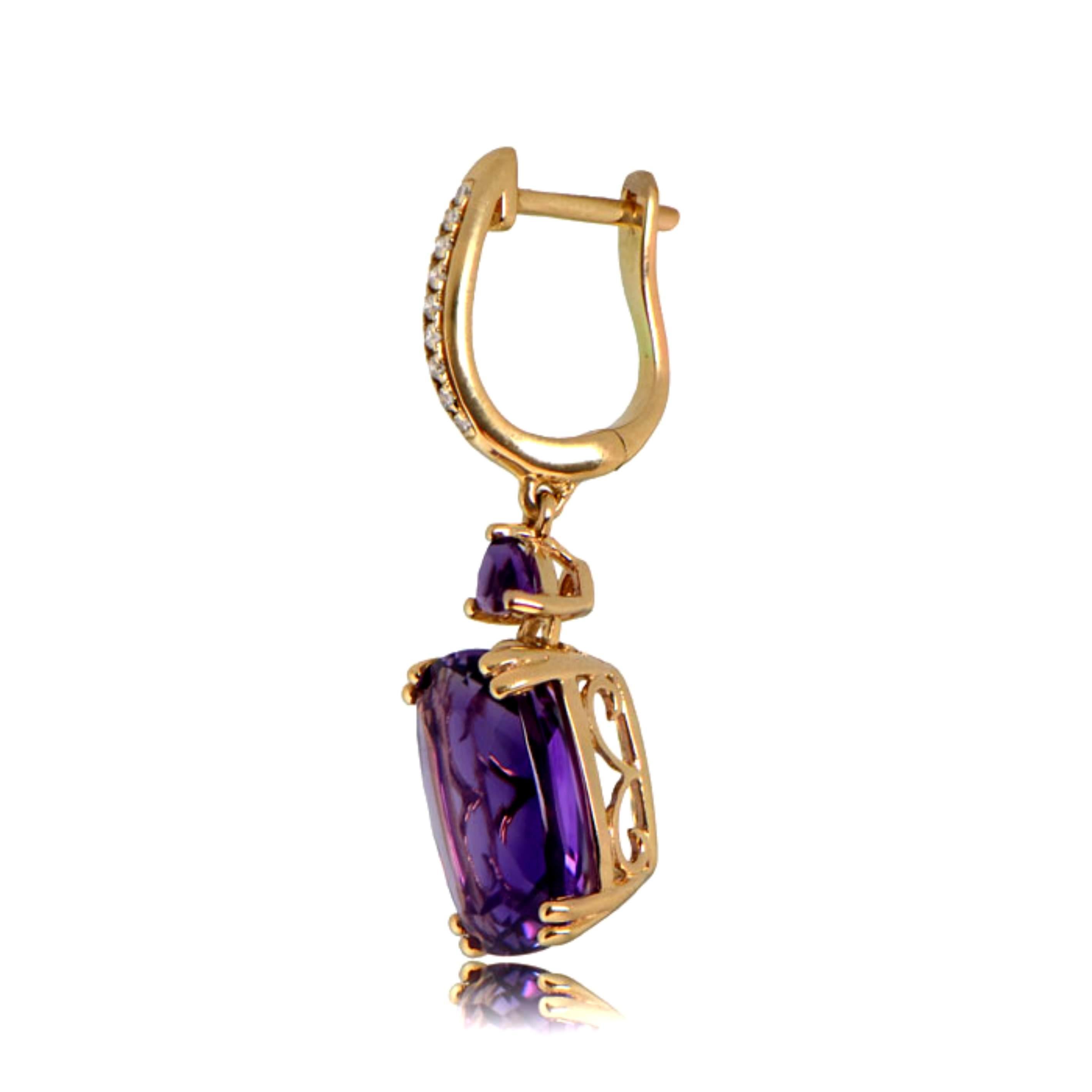 Embrace the enchanting allure of these long cushion-cut amethyst earrings, set in 14K yellow gold with exquisite openwork filigree. These earrings are a true testament to timeless elegance and meticulous craftsmanship. The cushion-cut amethysts,