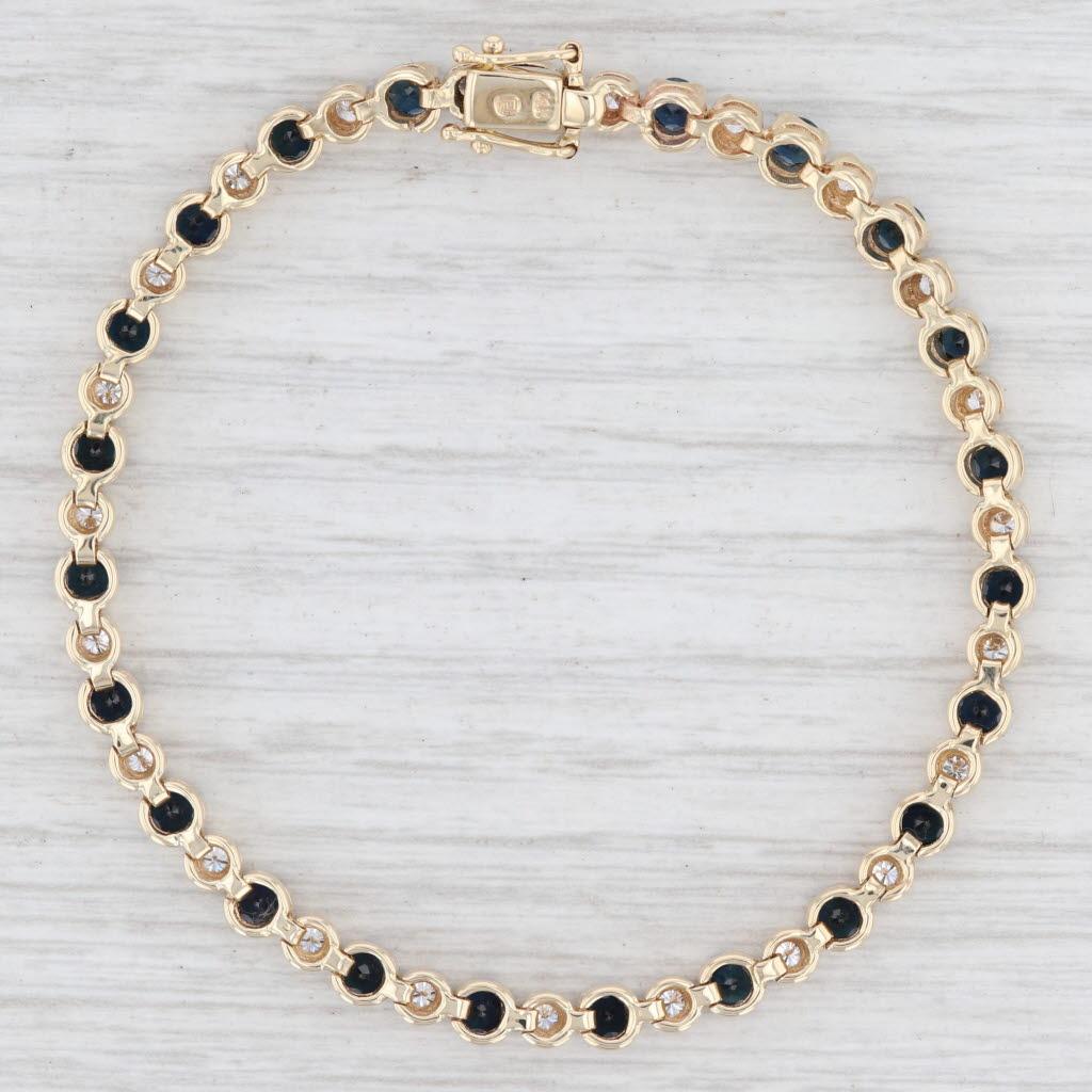 Taille ronde Bracelet tennis en or jaune 14 carats avec saphirs bleus et diamants blancs de 6,50 carats en vente