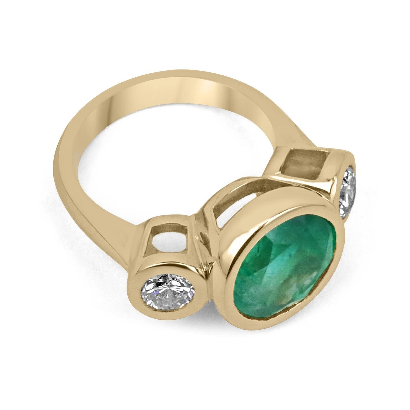 Displayed is an impressive AAA top-quality emerald & VS diamond three-stone ring in solid 18K yellow gold. This solitaire ring carries a rare, round VERY RARE Colombian emerald in a secure bezel setting. Fully faceted, this rare gemstone showcases