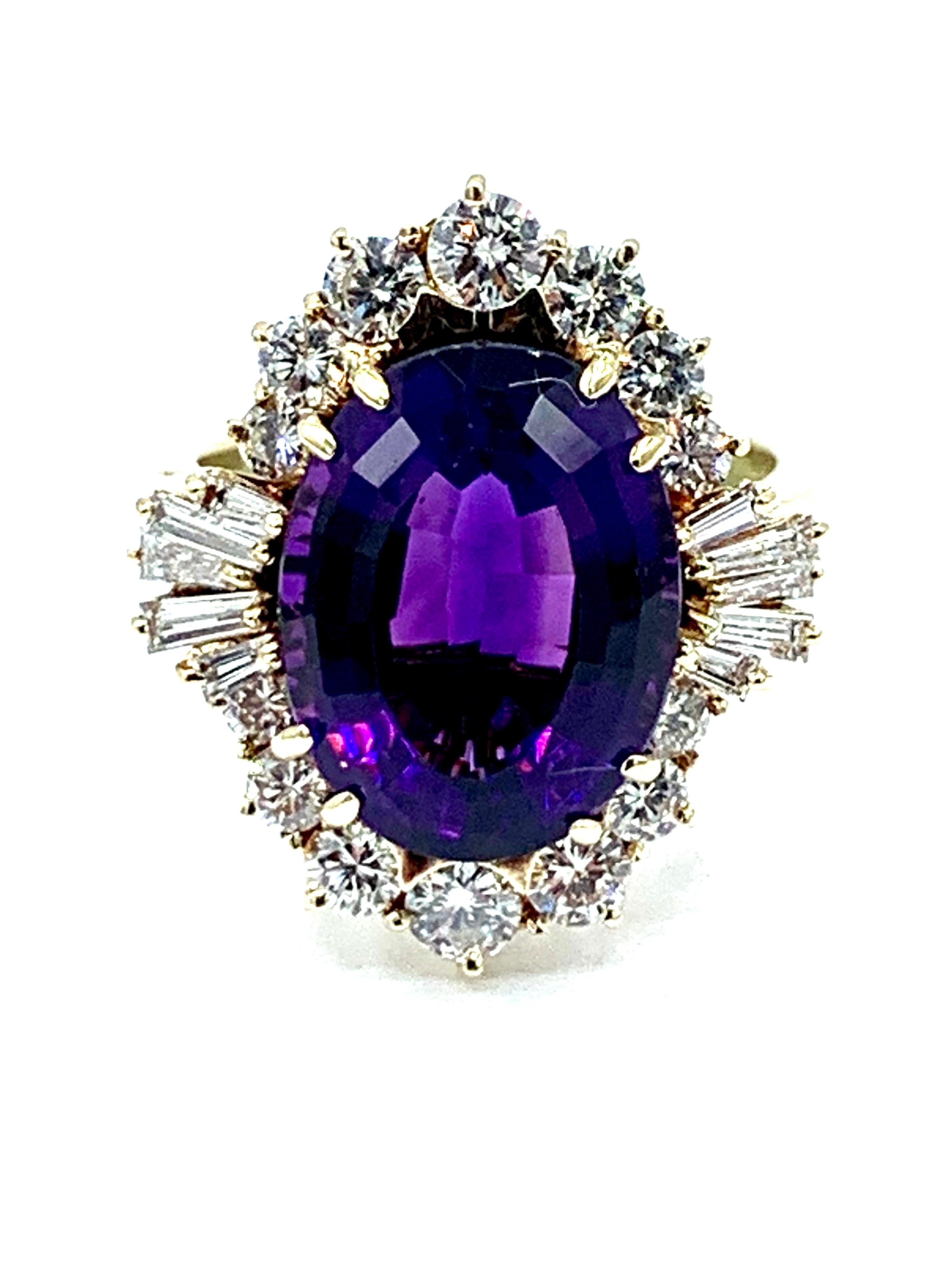 A rich purple 6.51 carat oval Amethyst cocktail ring.  The Amethyst is set in eight prongs, surrounded by a single row of Diamonds consisting of round brilliant cut and baguettes.  The Diamonds weigh 0.96 carats, and are graded G color, VS clarity. 