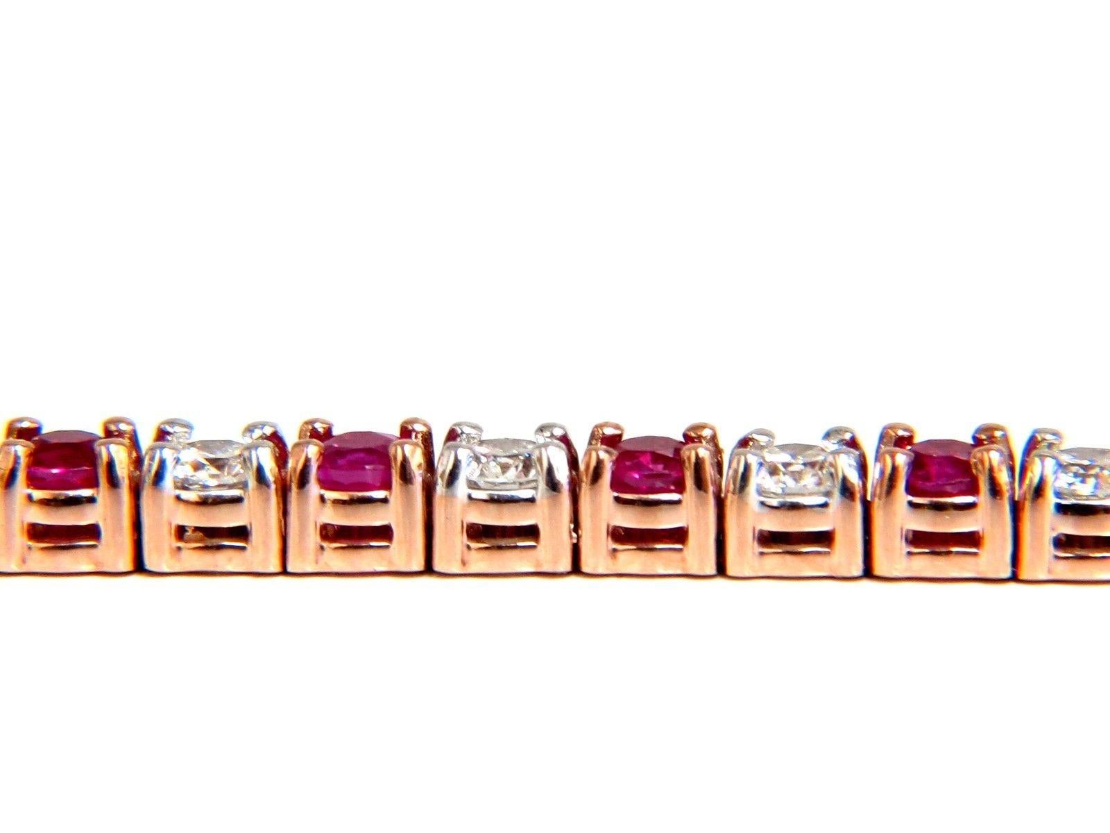 Round Cut 6.51 Carat Vivid Red Natural Ruby Diamonds Alternating Tennis Bracelet 14 Karat For Sale
