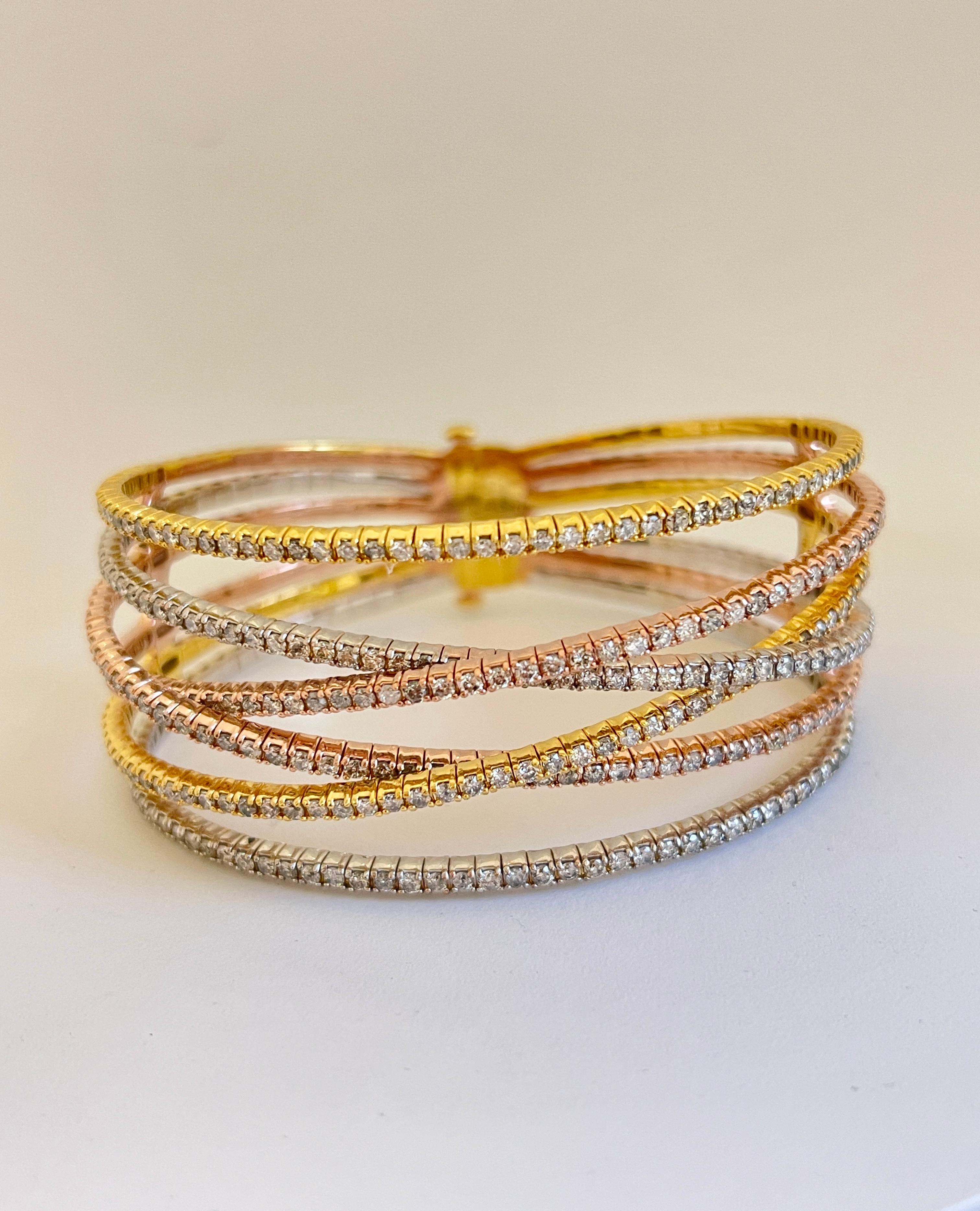 6.52 Carat Six Row Natural Diamonds Mini Bangle Bracelet Round-Brilliant Cut  14k Tri-Color Gold. 7 Inches, 322 pcs, 1 Inch Wide, Very Shiny 38.71grams

*Free shipping within U.S*