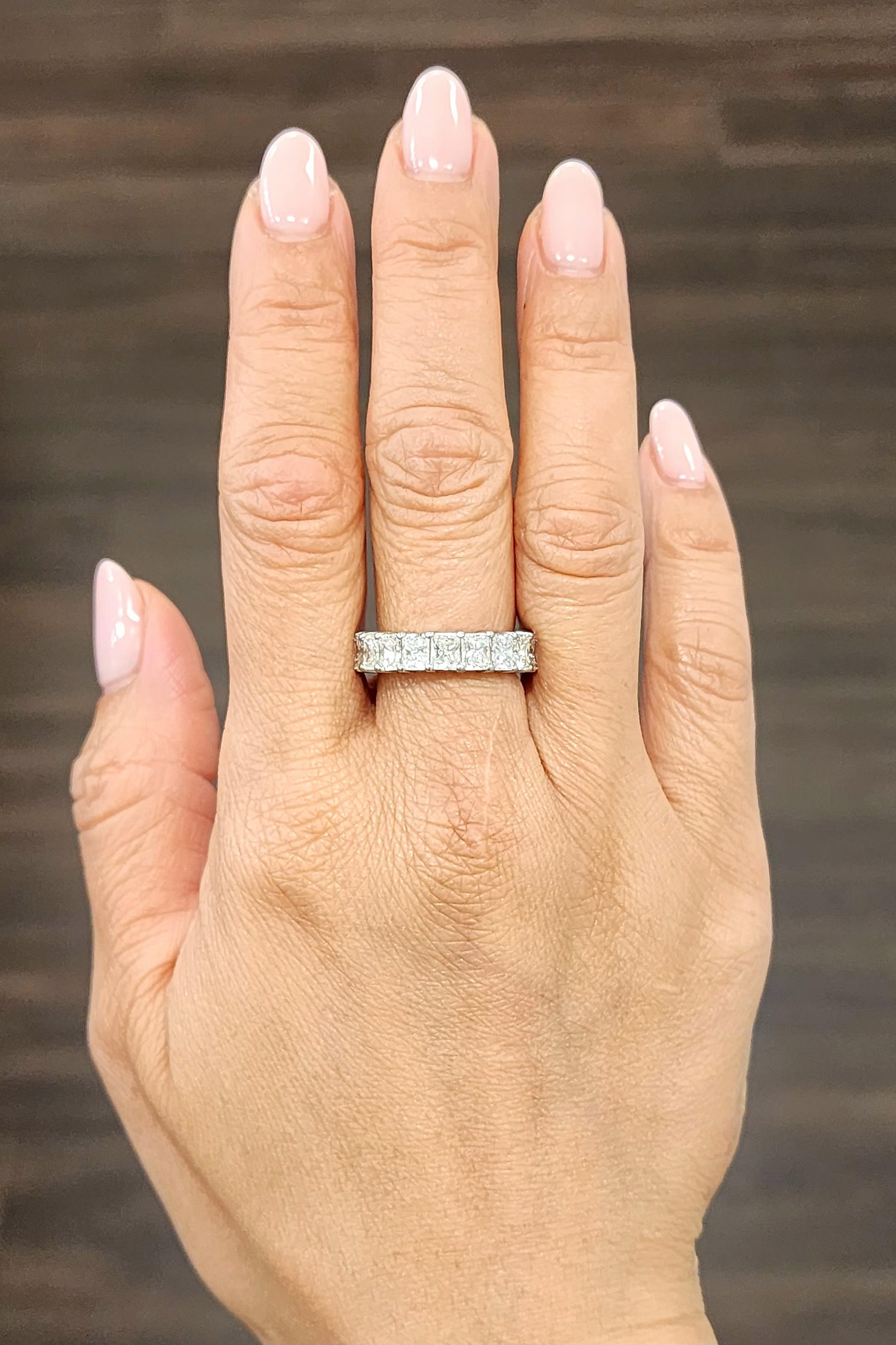 This beautiful ring features 20 radiant diamonds showcasing a color of G/H with a color of SI1/SI2. The stones are eye clean. A stunning ring to adorn one's finger.
