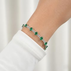 6.52ct Oval Zambian Emerald 2.62ct Diamond 14 Karat White Gold Tennis Bracelet