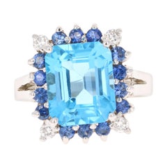Anello in oro bianco 14 carati con topazio blu da 6,53 carati, zaffiro blu e diamanti