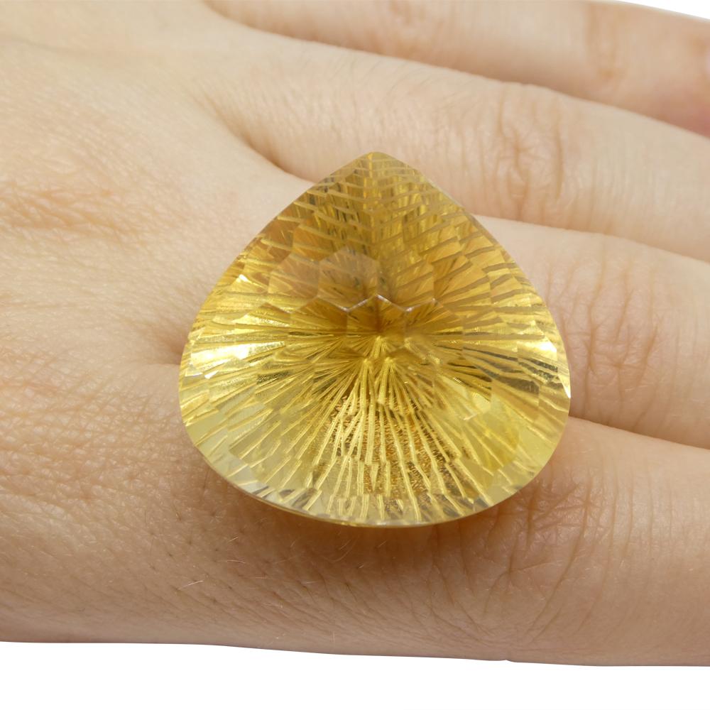 Description:

Gem Type: Citrine
Number of Stones: 1
Weight: 65.36 cts
Measurements: 26.40 x 26.02 x 21.00 mm
Shape: Pear Shape
Cutting Style Crown: Honeycomb
Cutting Style Pavilion: Brilliant Cut
Transparency: Transparent
Clarity: Very Very Slightly