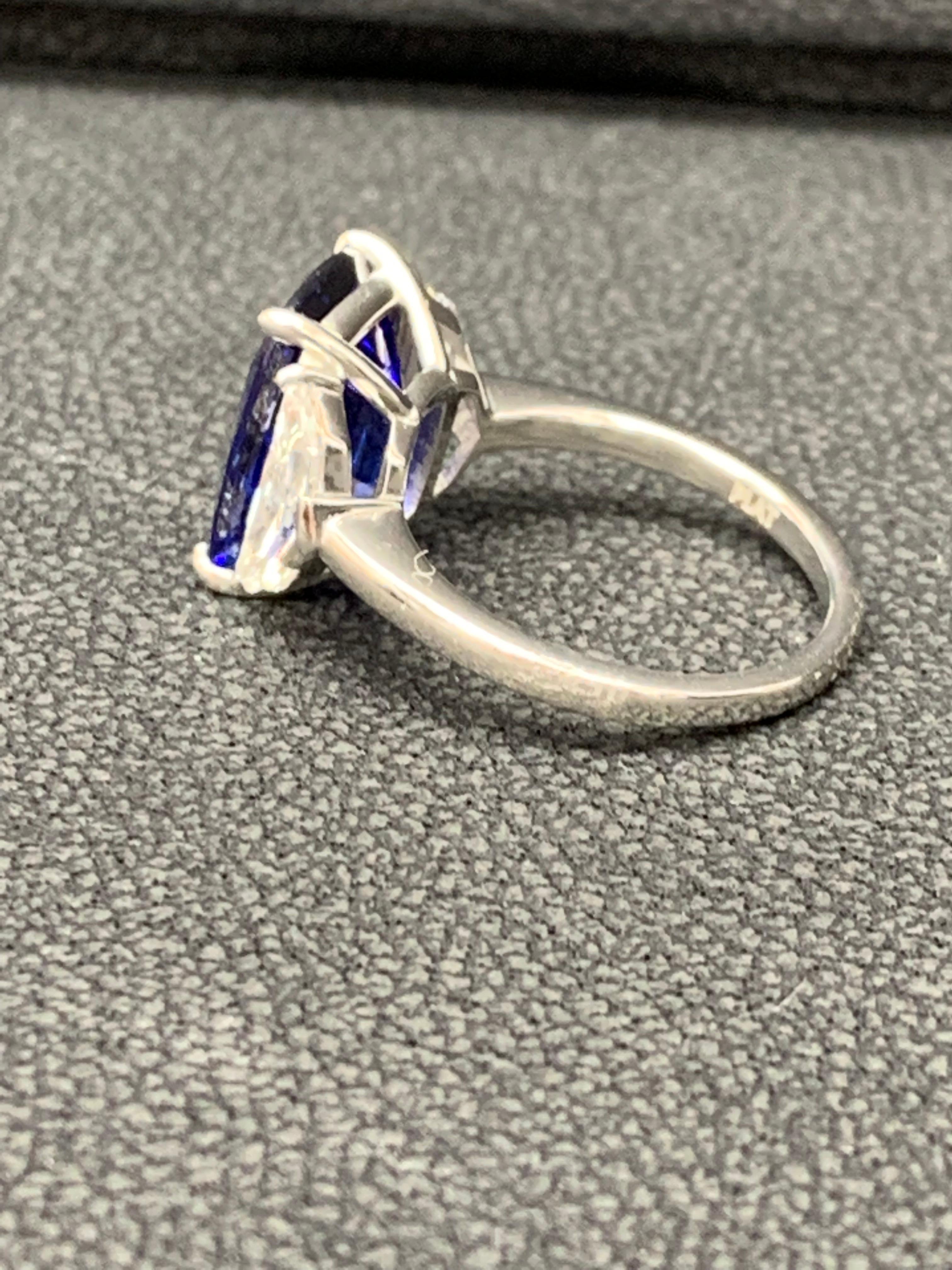 6.54 Carat Blue Sapphire and Diamond Three-Stone Engagement Ring in Platinum In New Condition For Sale In NEW YORK, NY