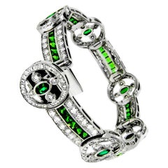 6.54 Carat Tsavorite and Emerald Diamond Bracelet