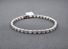 Bracciale Tennis 6.54 carati taglio smeraldo con castone Est-Ovest