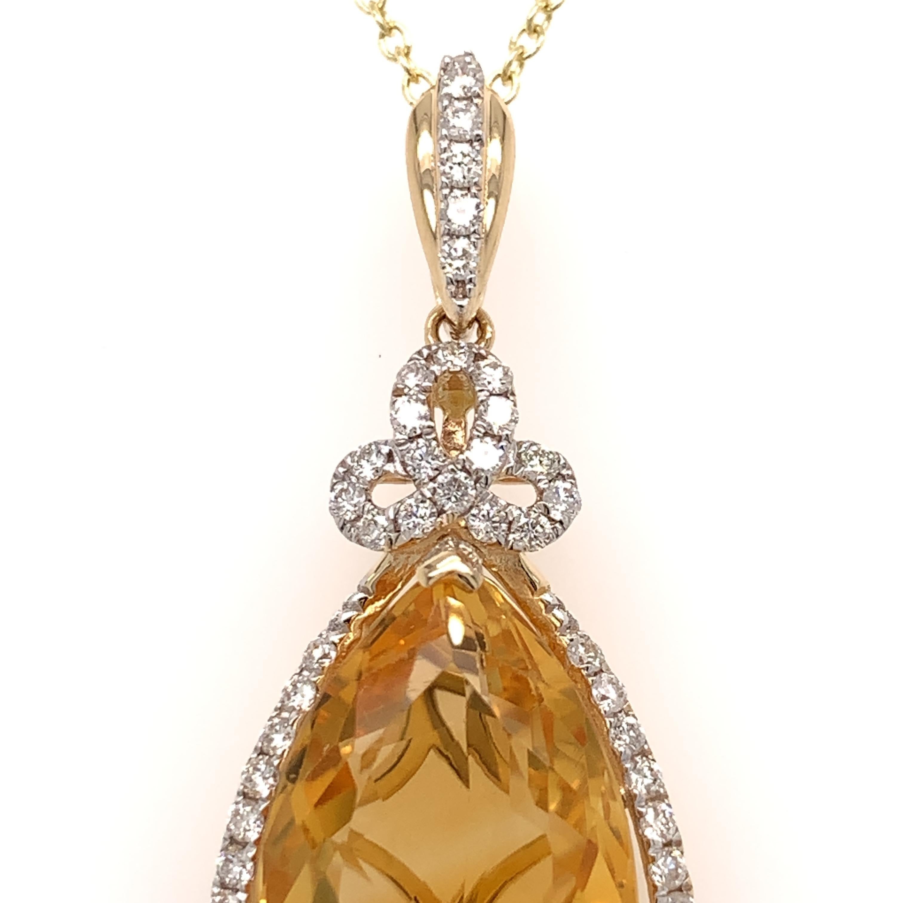 Elegant citrine diamond pendant. High brilliance, golden honey yellow, trillion faceted, natural 6.55 carats citrine encased in basket mount with three prongs,  accented with round. brilliant cut diamonds. Handcrafted fine design set in 14 karats