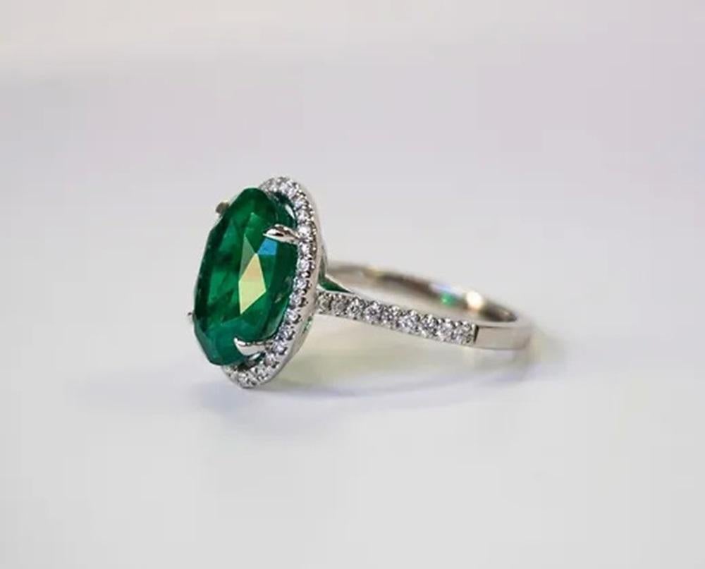 Oval Cut 6.55 Carat Emerald Oval Ring For Sale