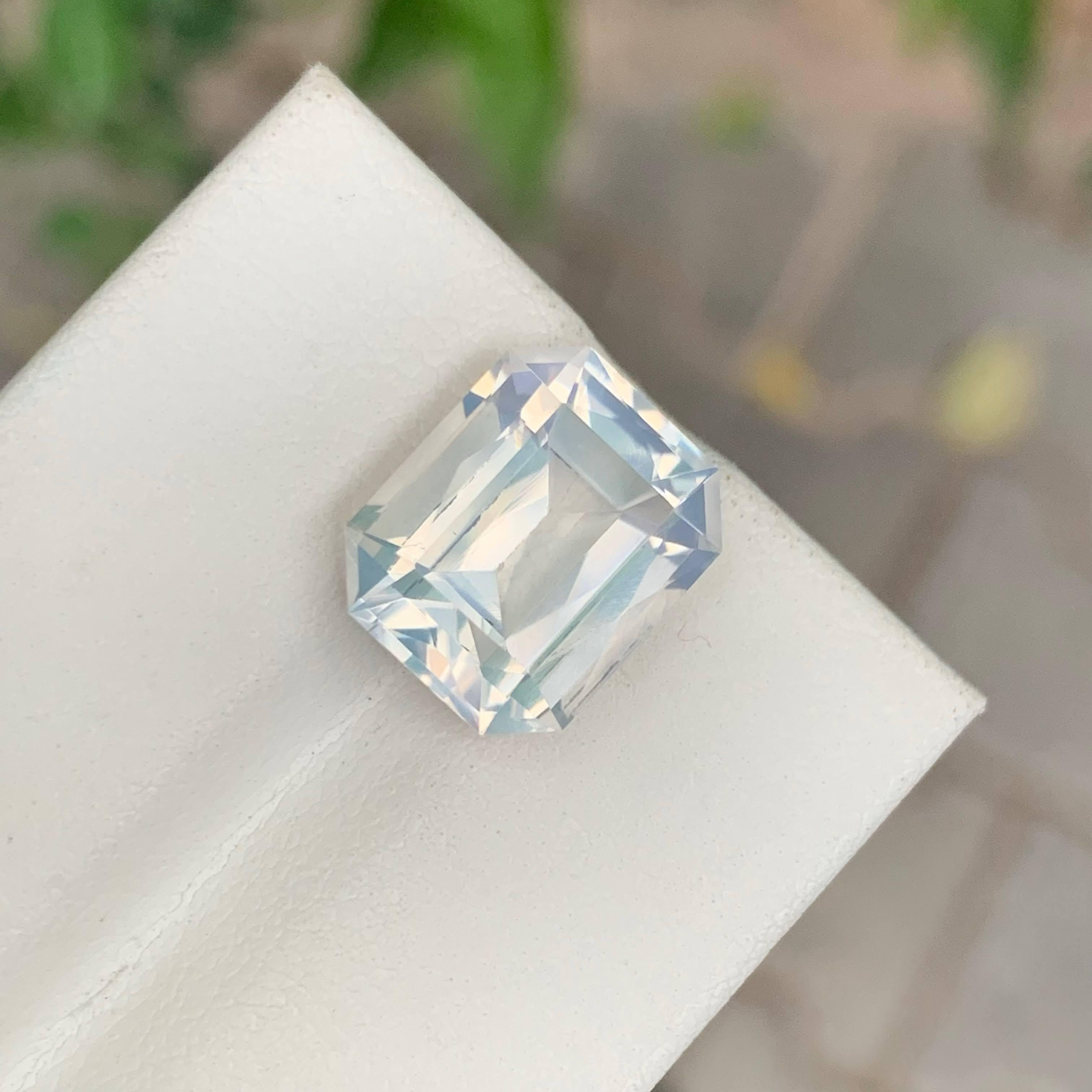 Modern 6.55 Carat Natural Loose Milky Quartz Stone Emerald Cut Faceted African Gemstone For Sale