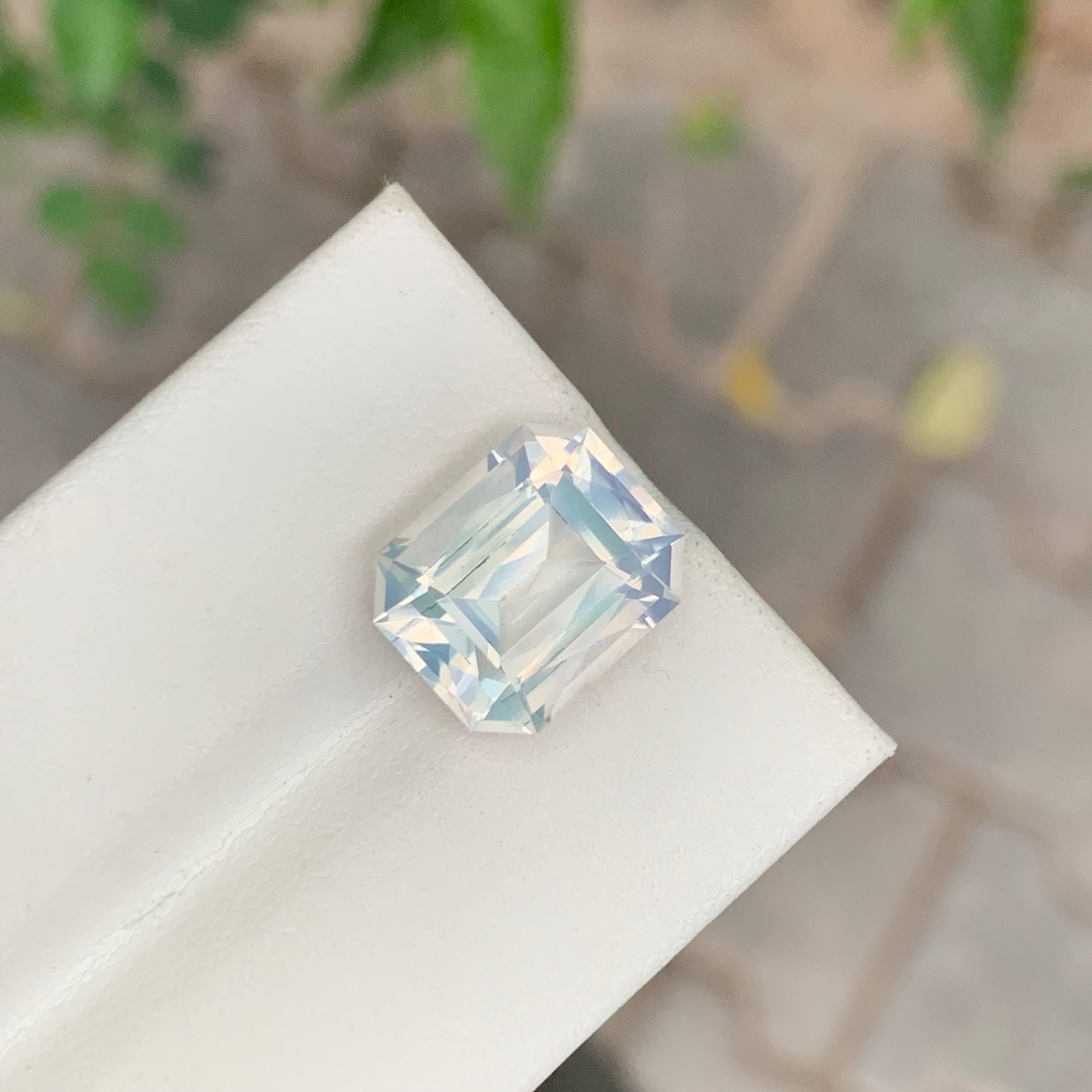Women's or Men's 6.55 Carat Natural Loose Milky Quartz Stone Emerald Cut Faceted African Gemstone For Sale